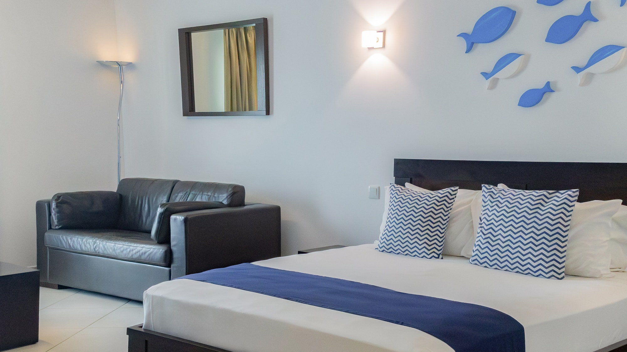 a bed and a couch in a room