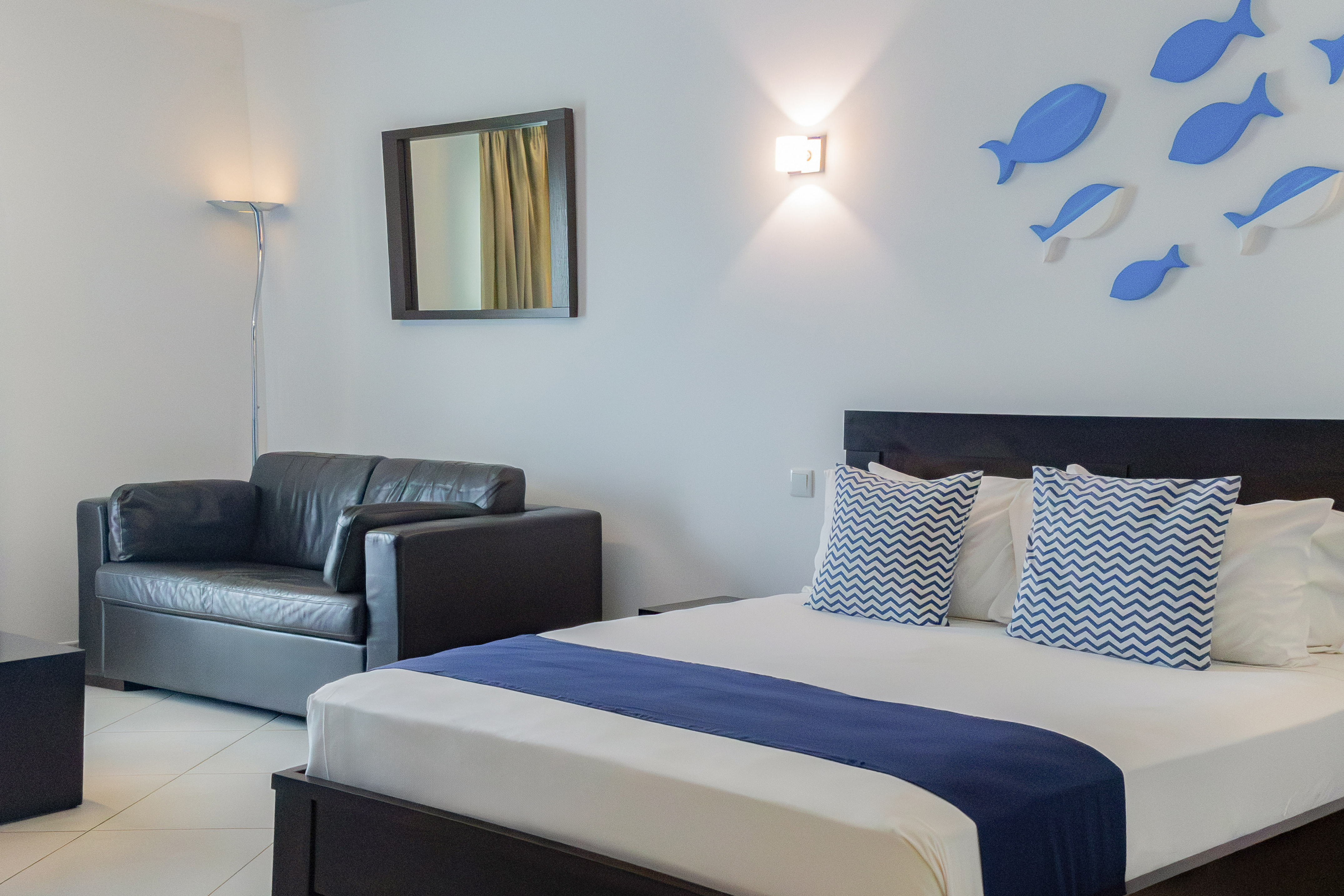 a bed and a couch in a room