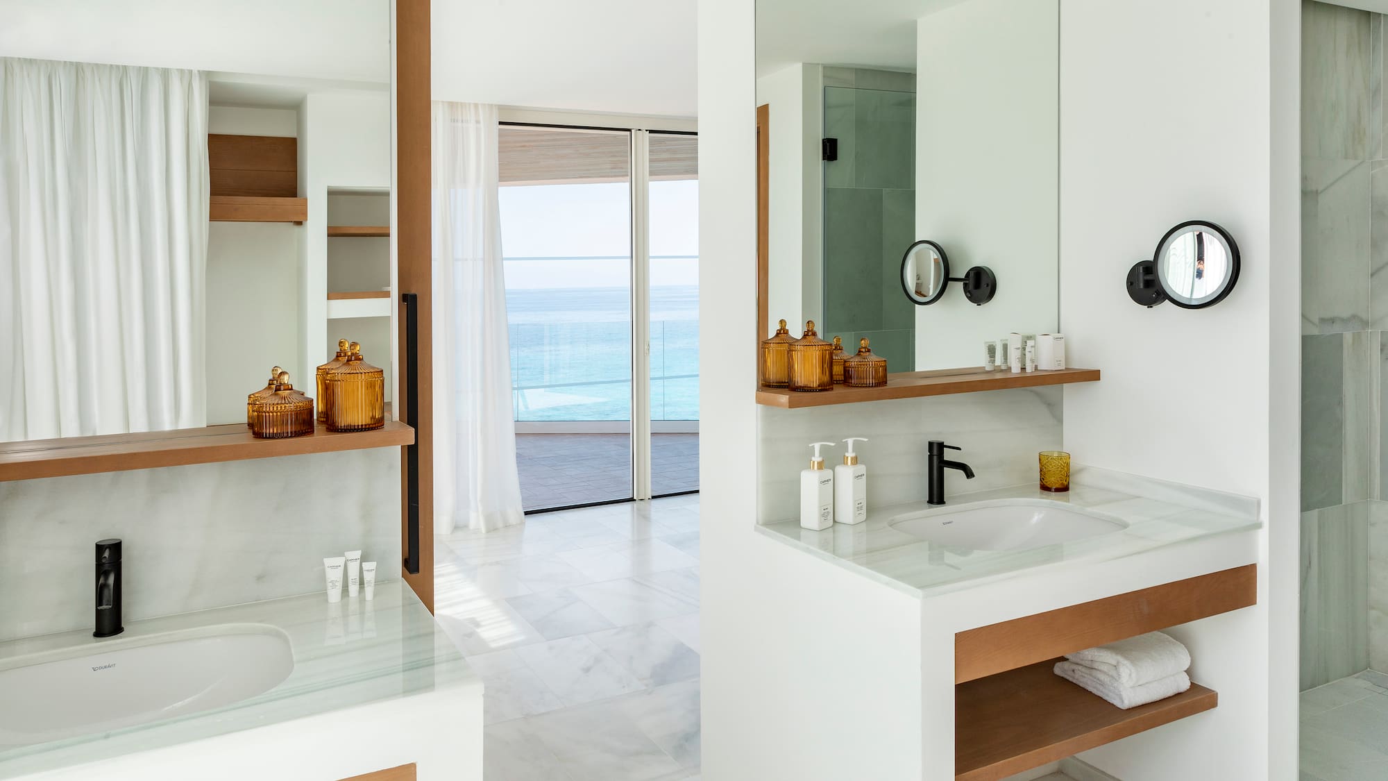 a bathroom with a large mirror and a sink
