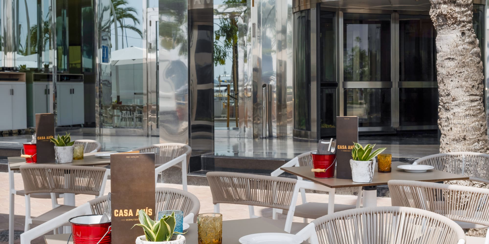 a table and chairs outside of a building
