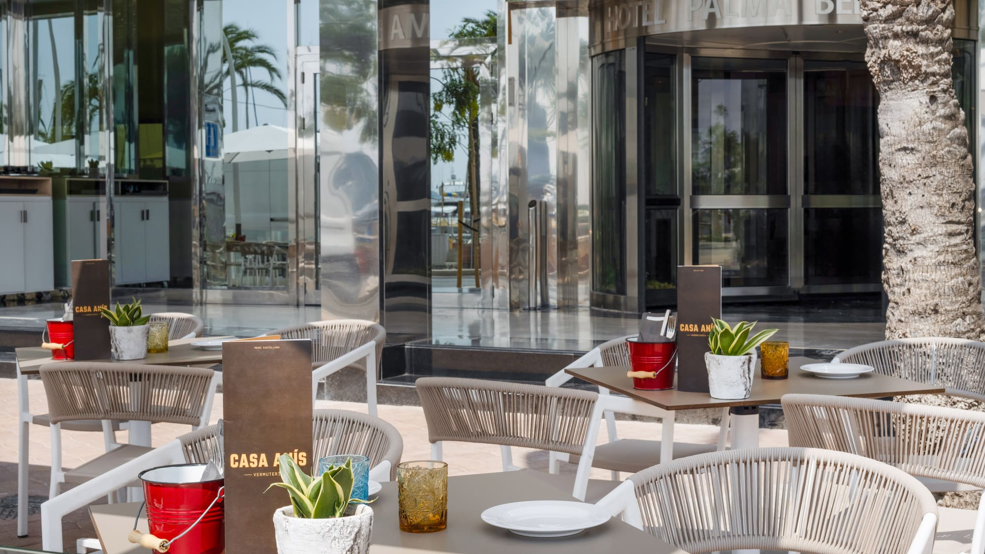 a table and chairs outside of a building