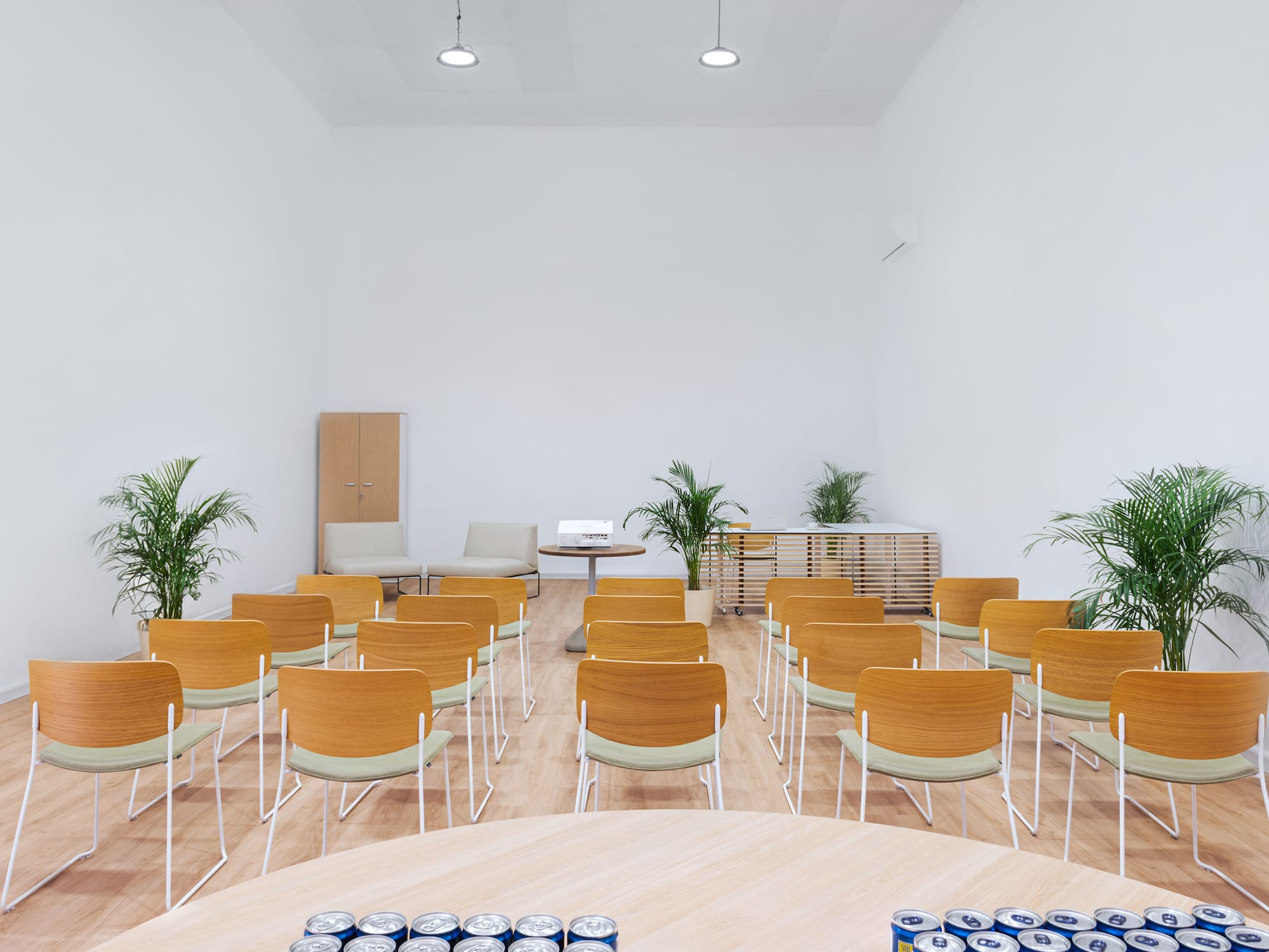 a room with chairs and tables