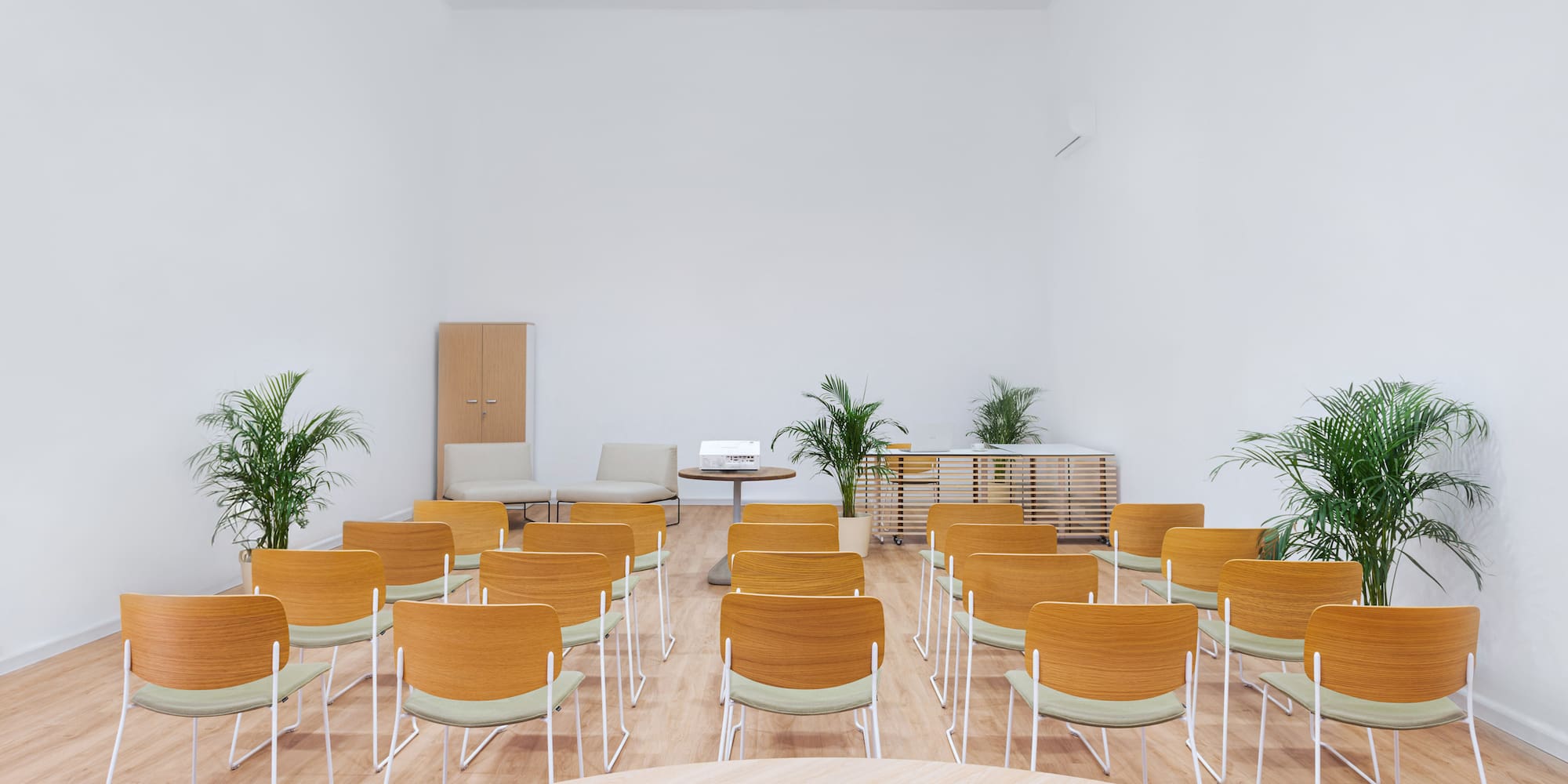 a room with chairs and tables