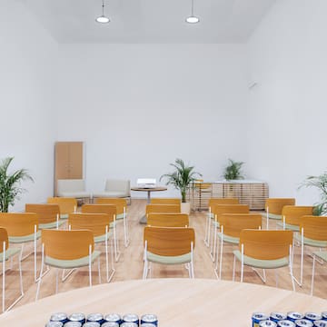 a room with chairs and tables