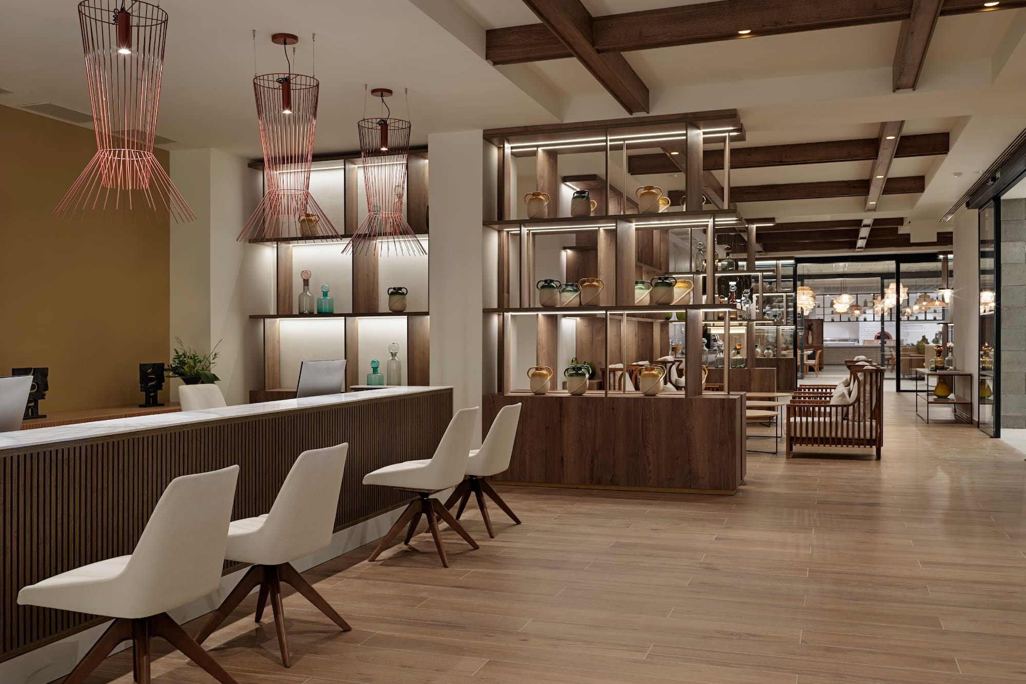 a room with a counter and chairs