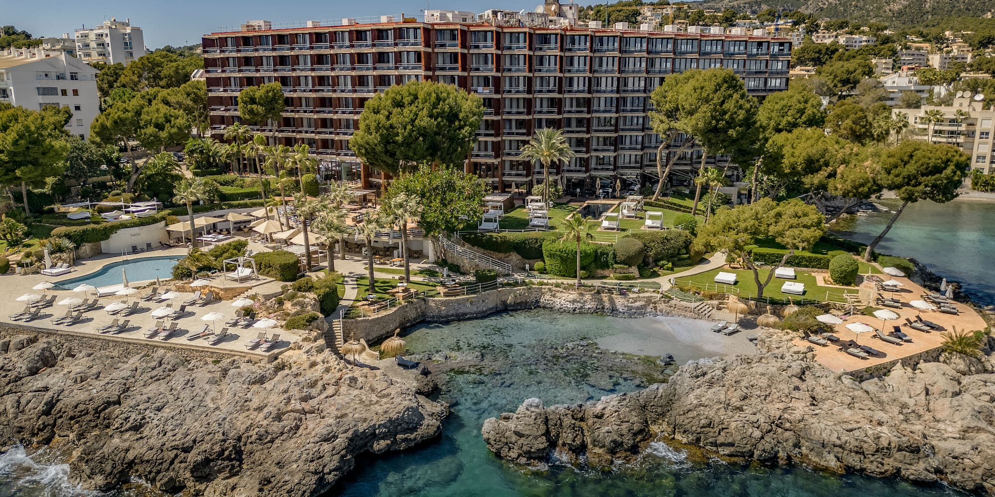 a large building next to a body of water
