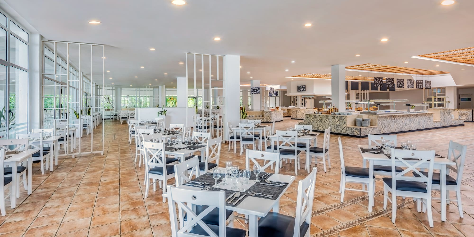 a restaurant with tables and chairs