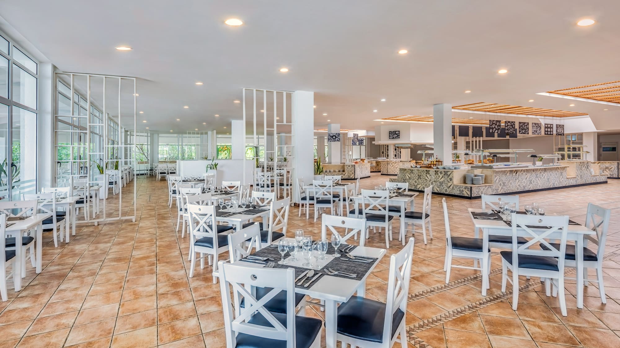 a restaurant with tables and chairs