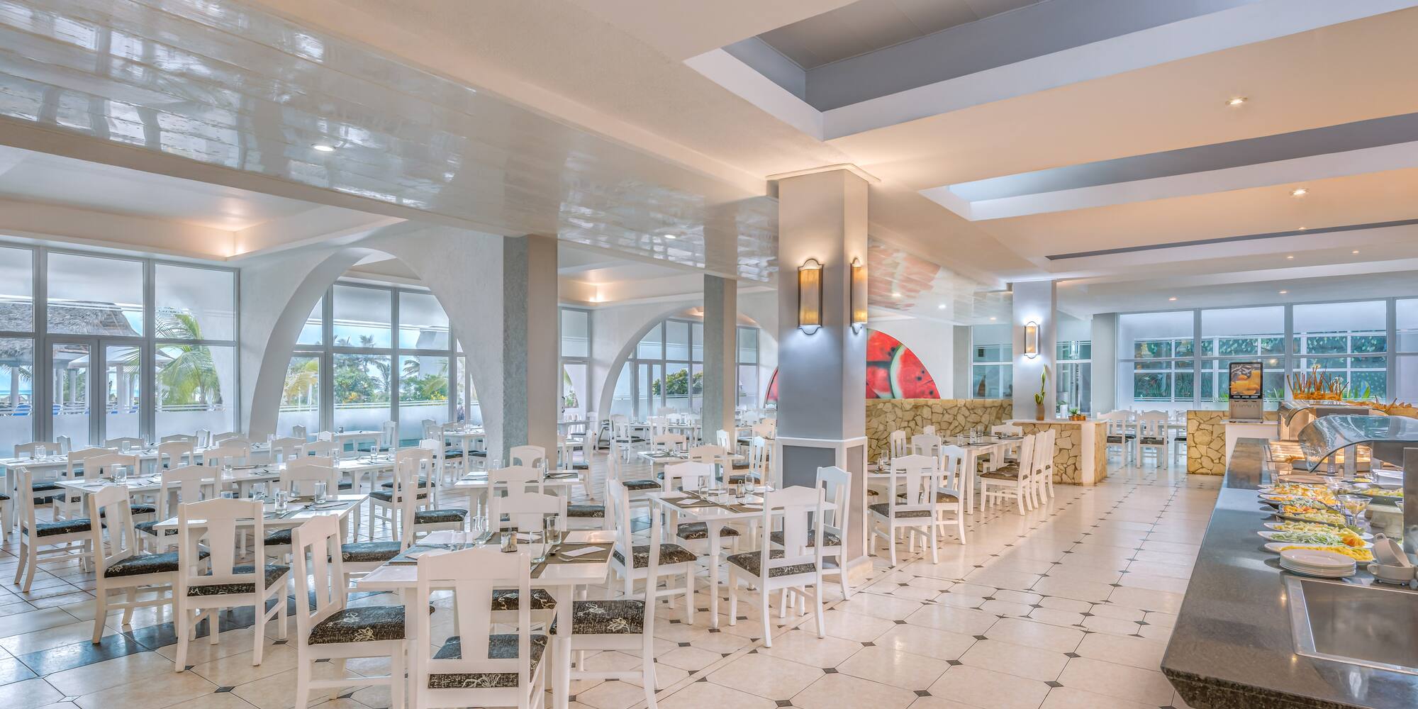 a room with tables and chairs