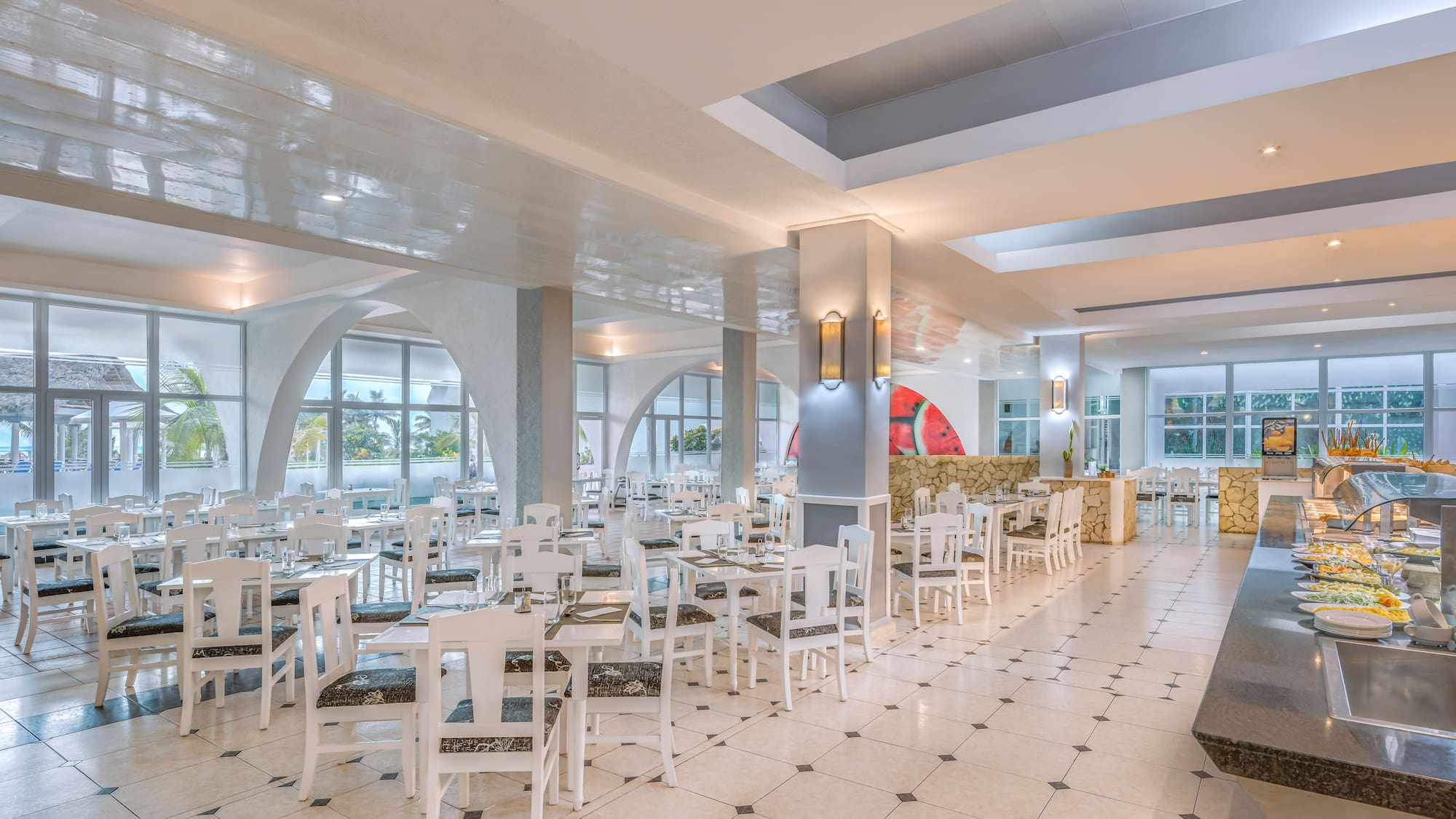 a room with tables and chairs