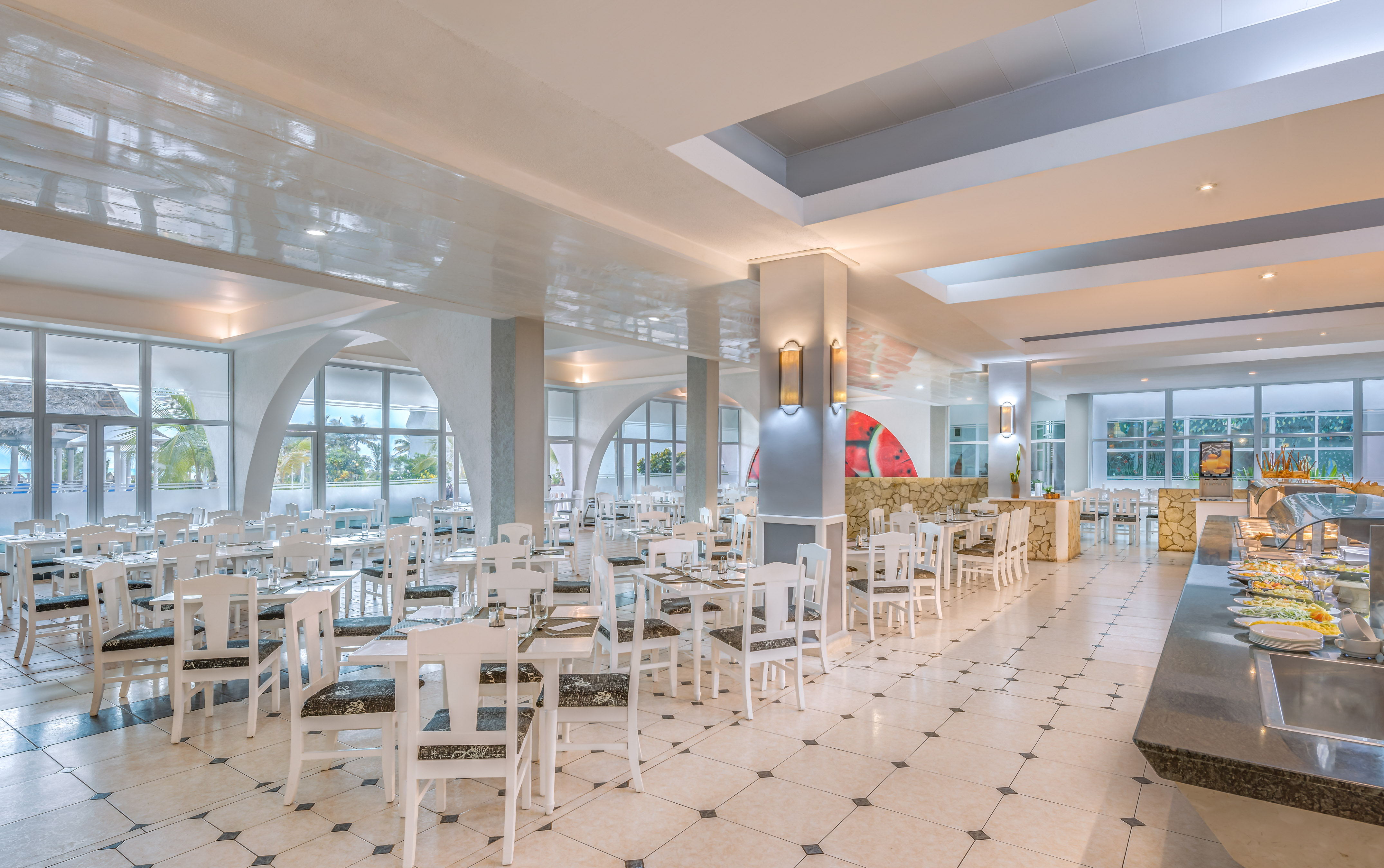 a room with tables and chairs