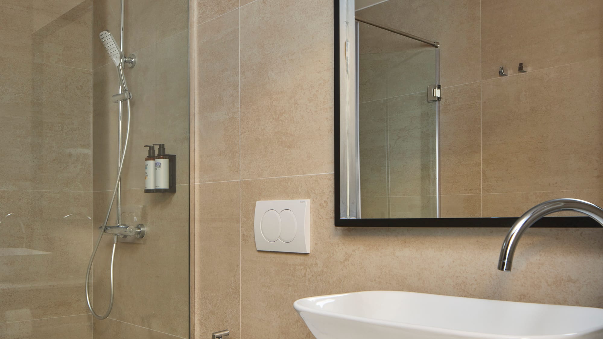 a bathroom with a sink and shower