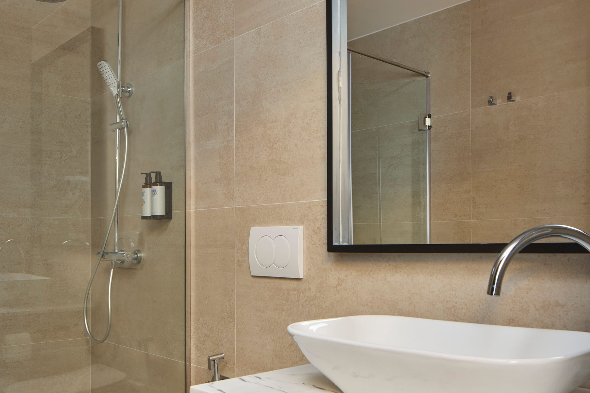 a bathroom with a sink and shower