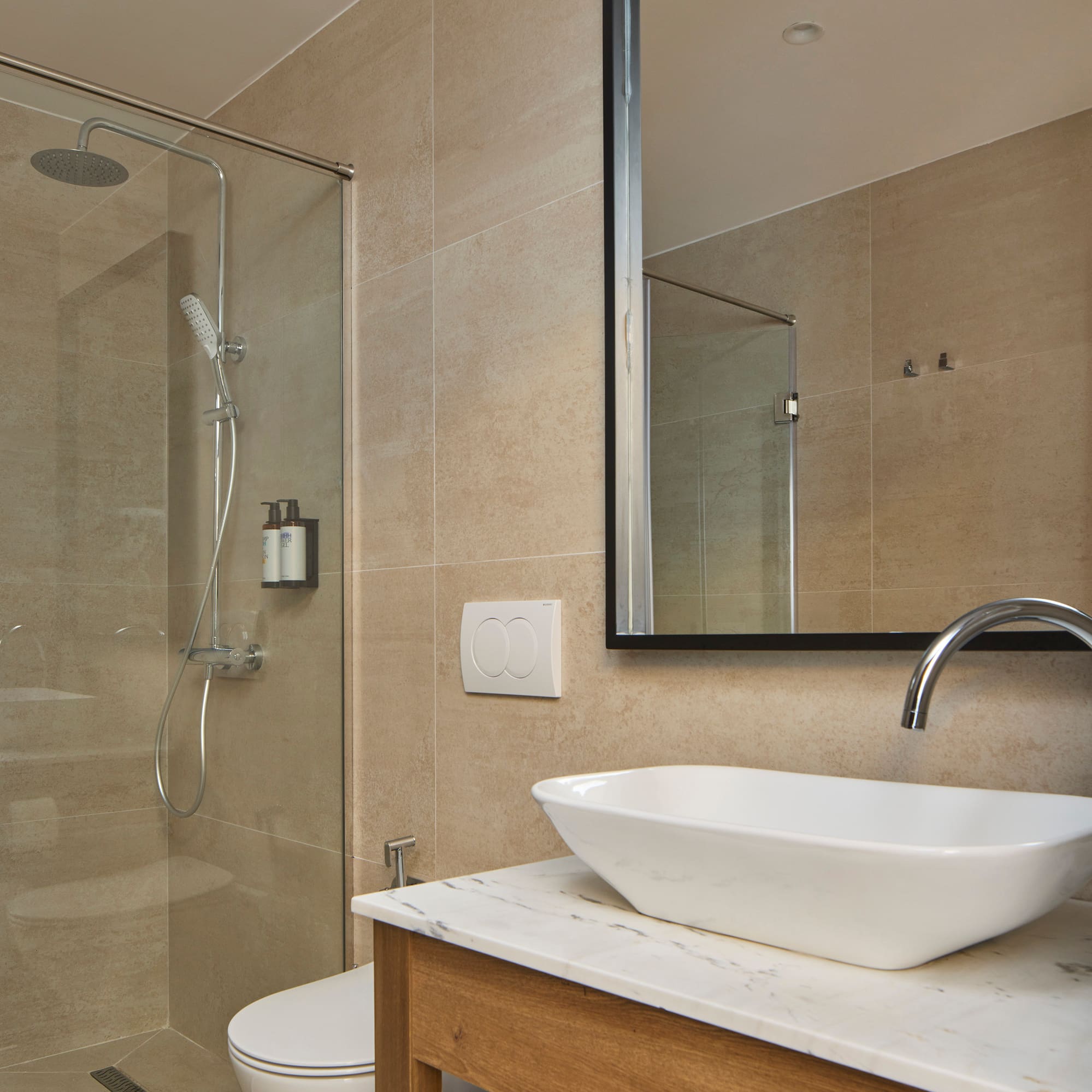 a bathroom with a sink and shower