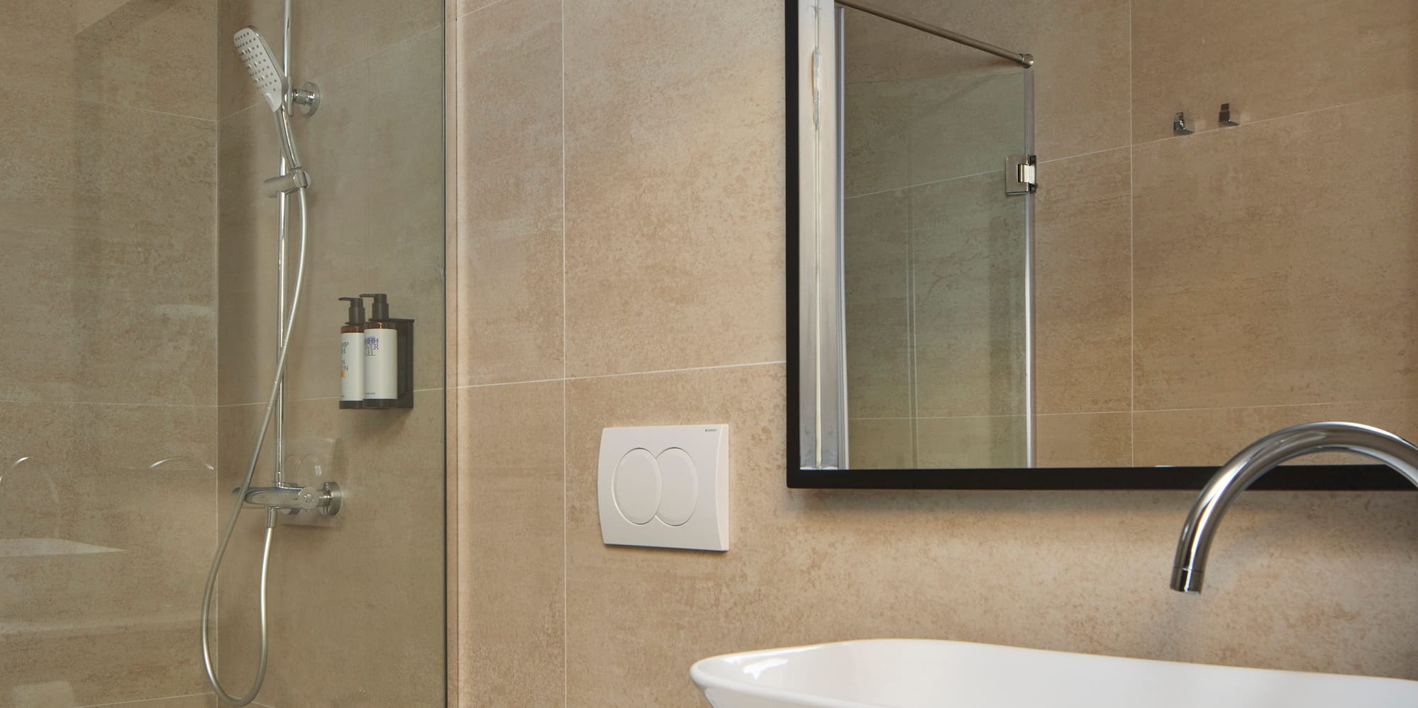 a bathroom with a sink and shower