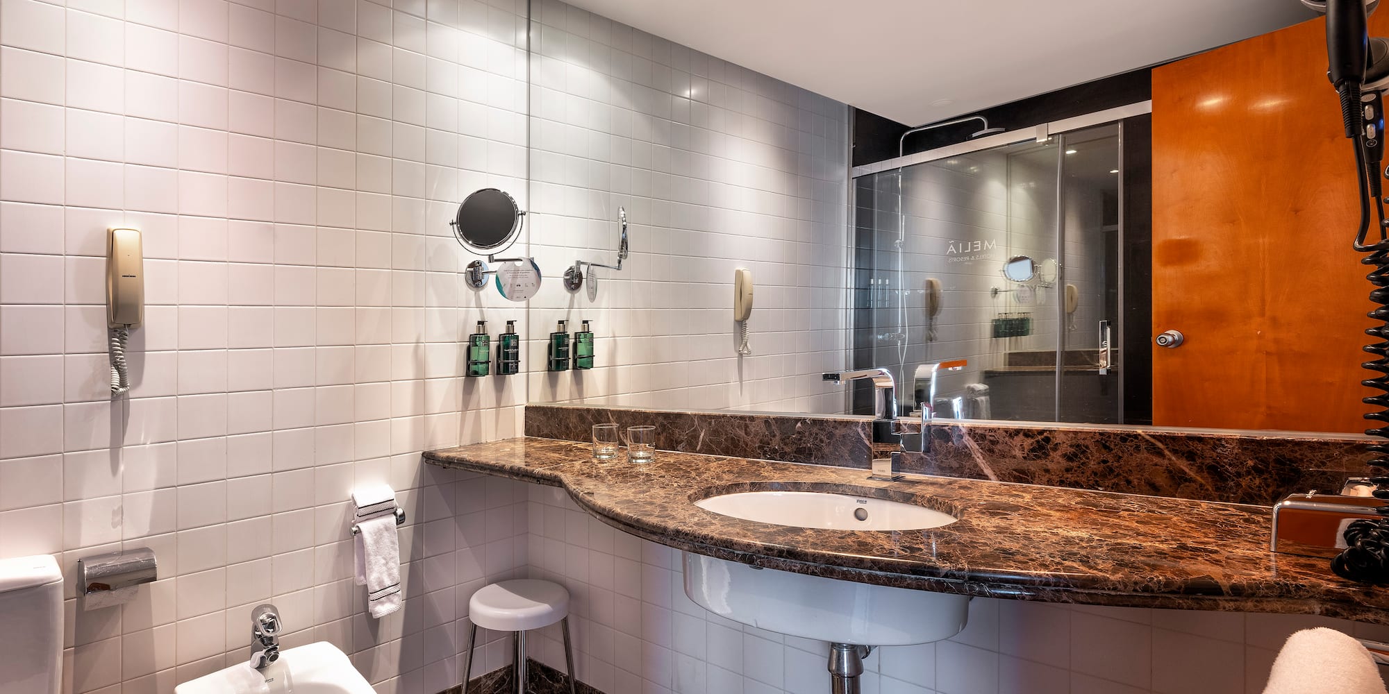 a bathroom with a sink and toilet
