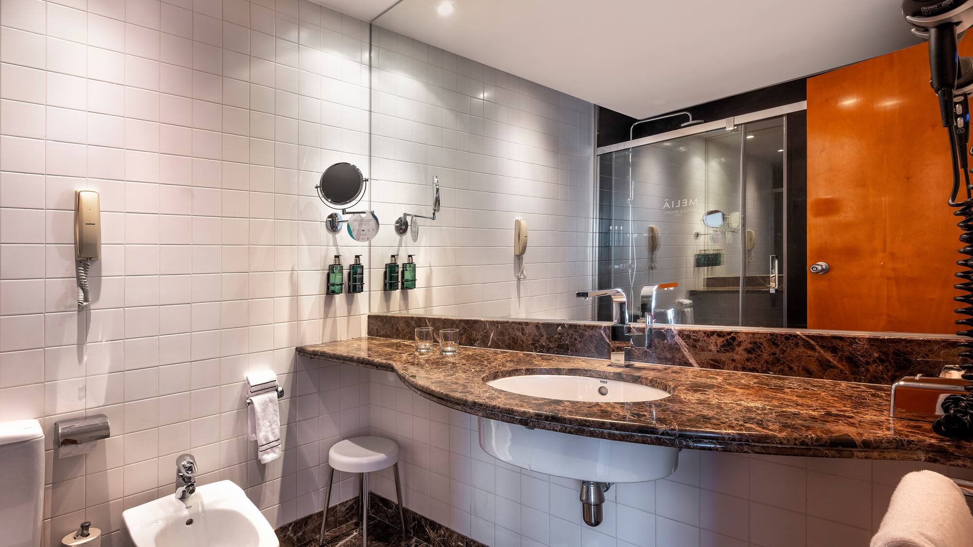 a bathroom with a sink and toilet