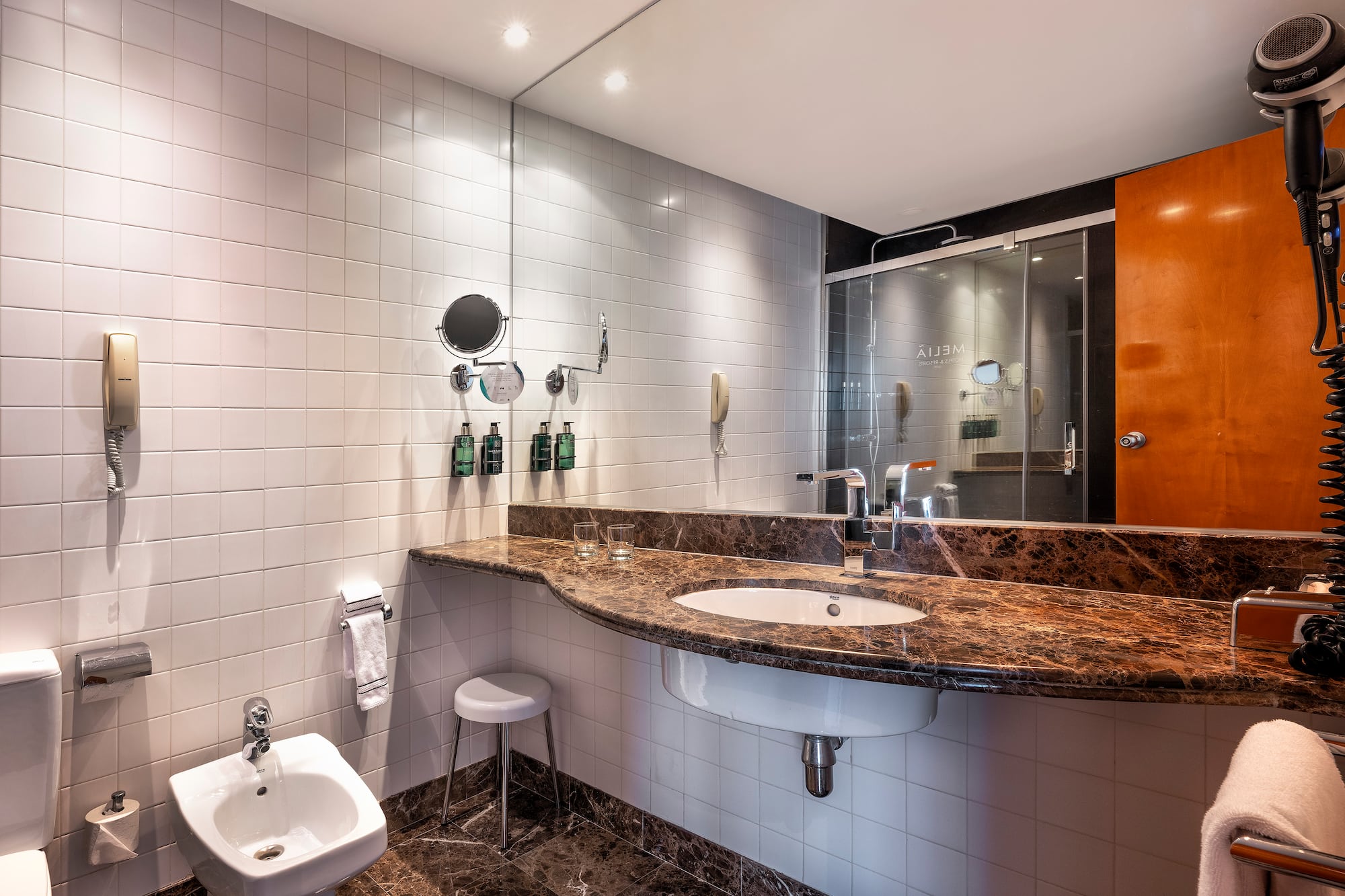 a bathroom with a sink and toilet