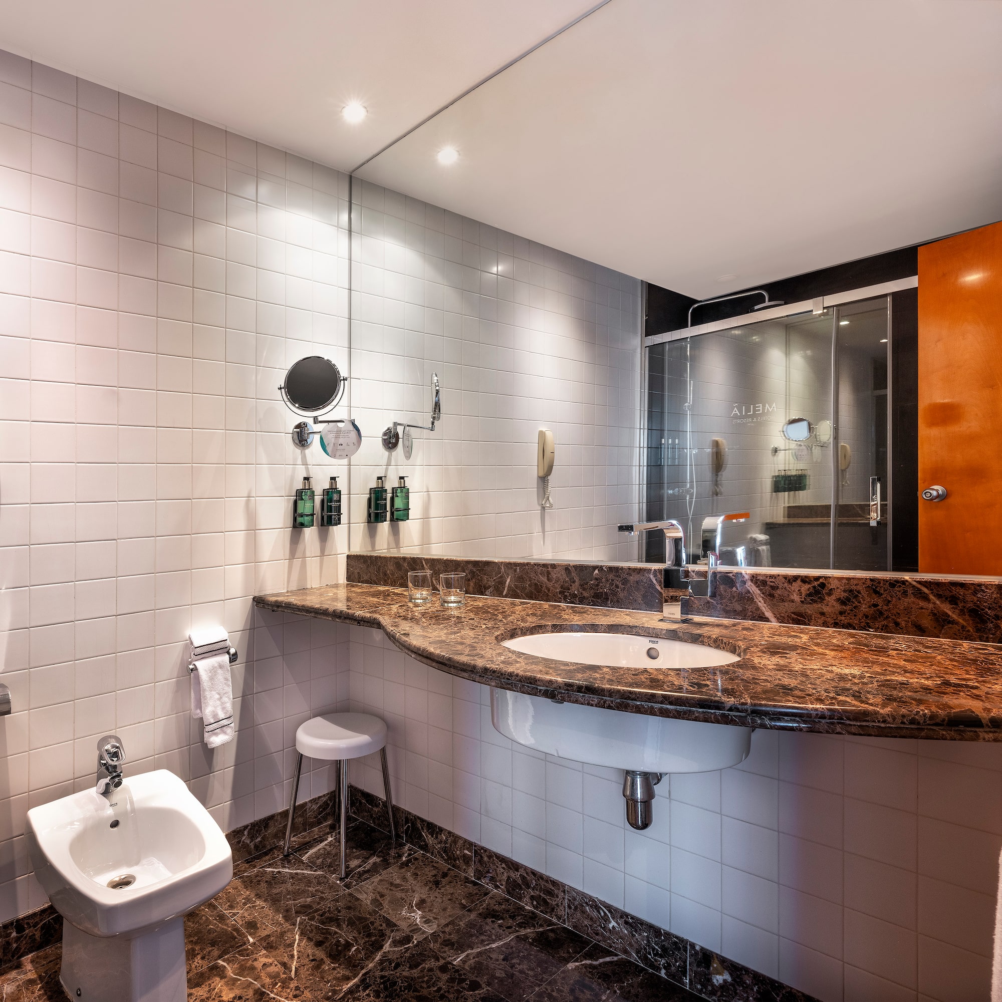 a bathroom with a sink and toilet