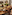 Elegant hotel reception buffet with fresh fruit, champagne, and appetizers.