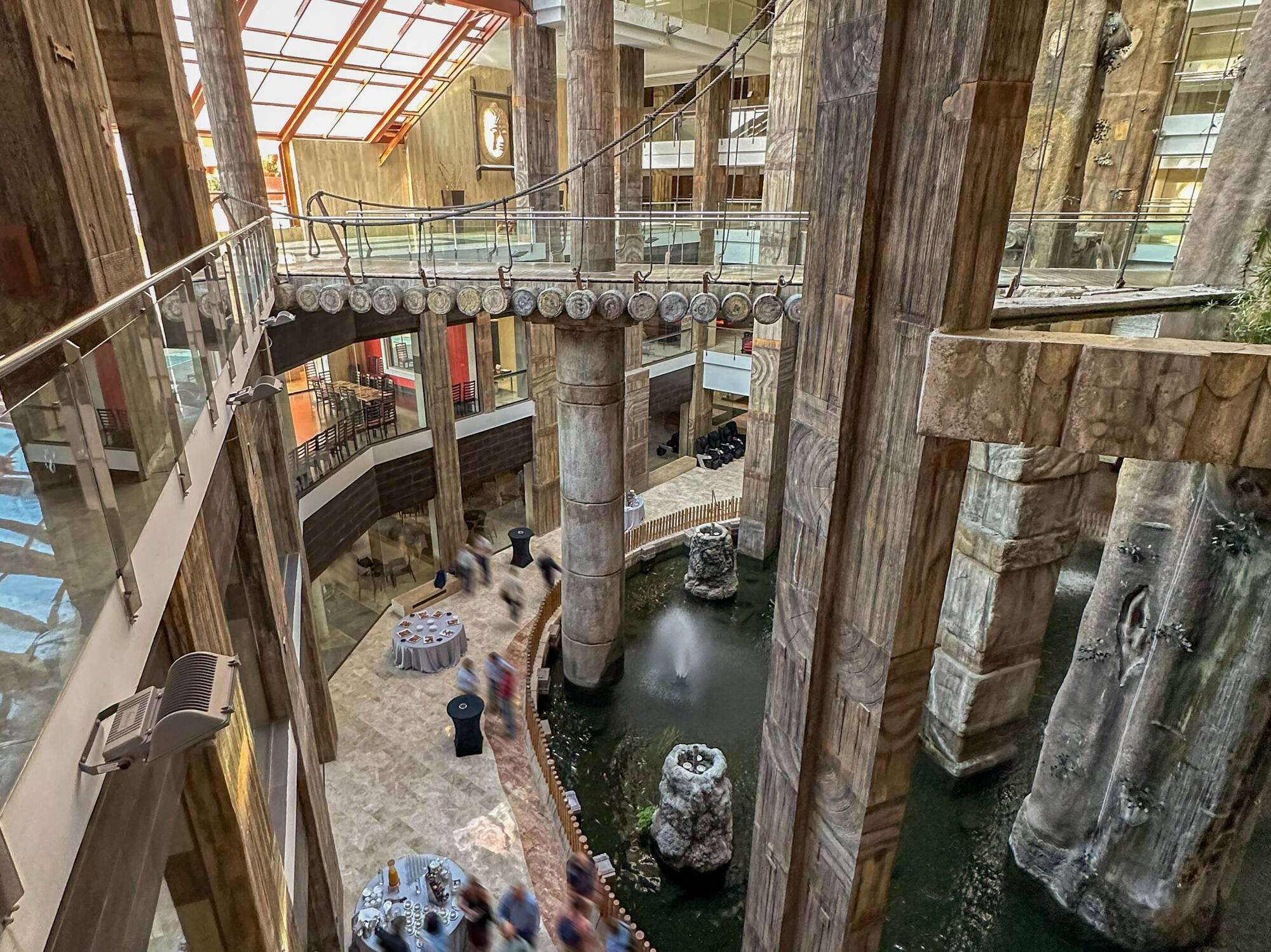 a group of people walking in a mall