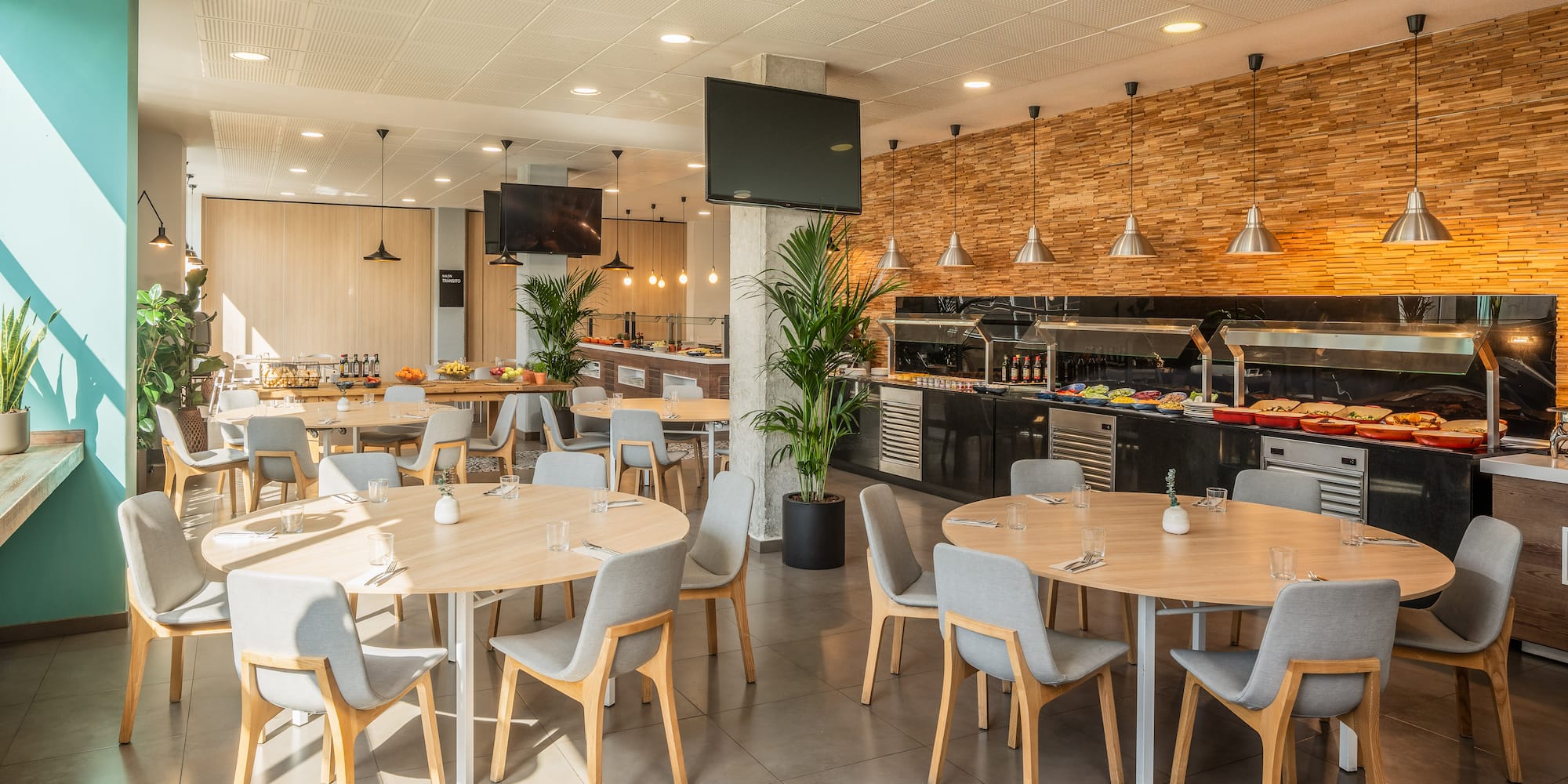 a restaurant with tables and chairs