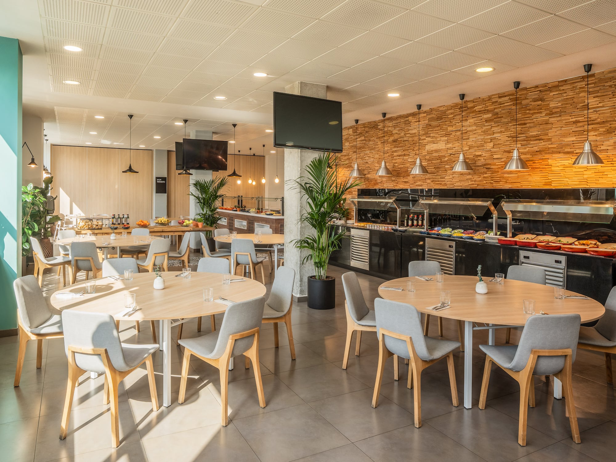 a restaurant with tables and chairs