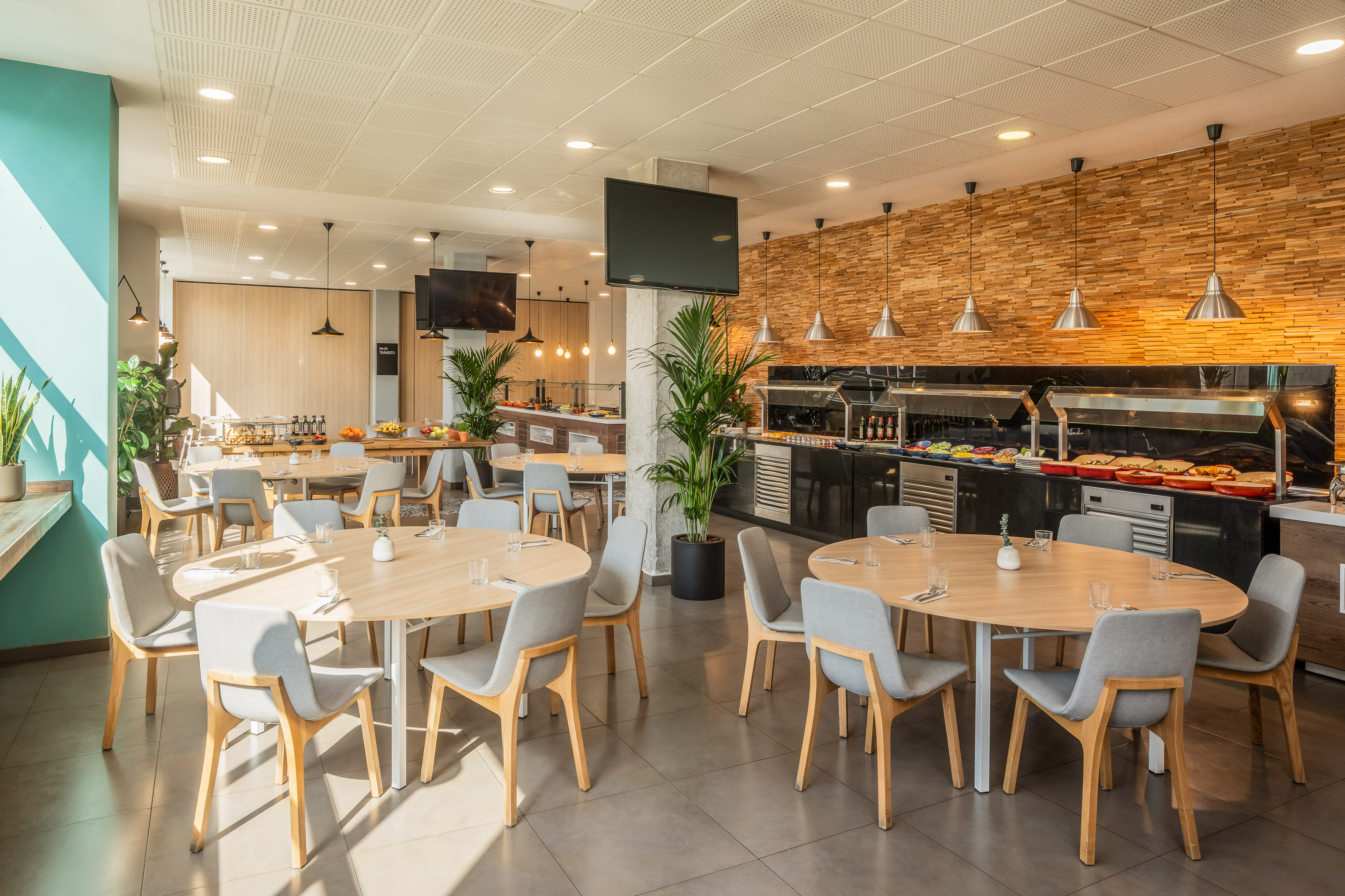 a restaurant with tables and chairs