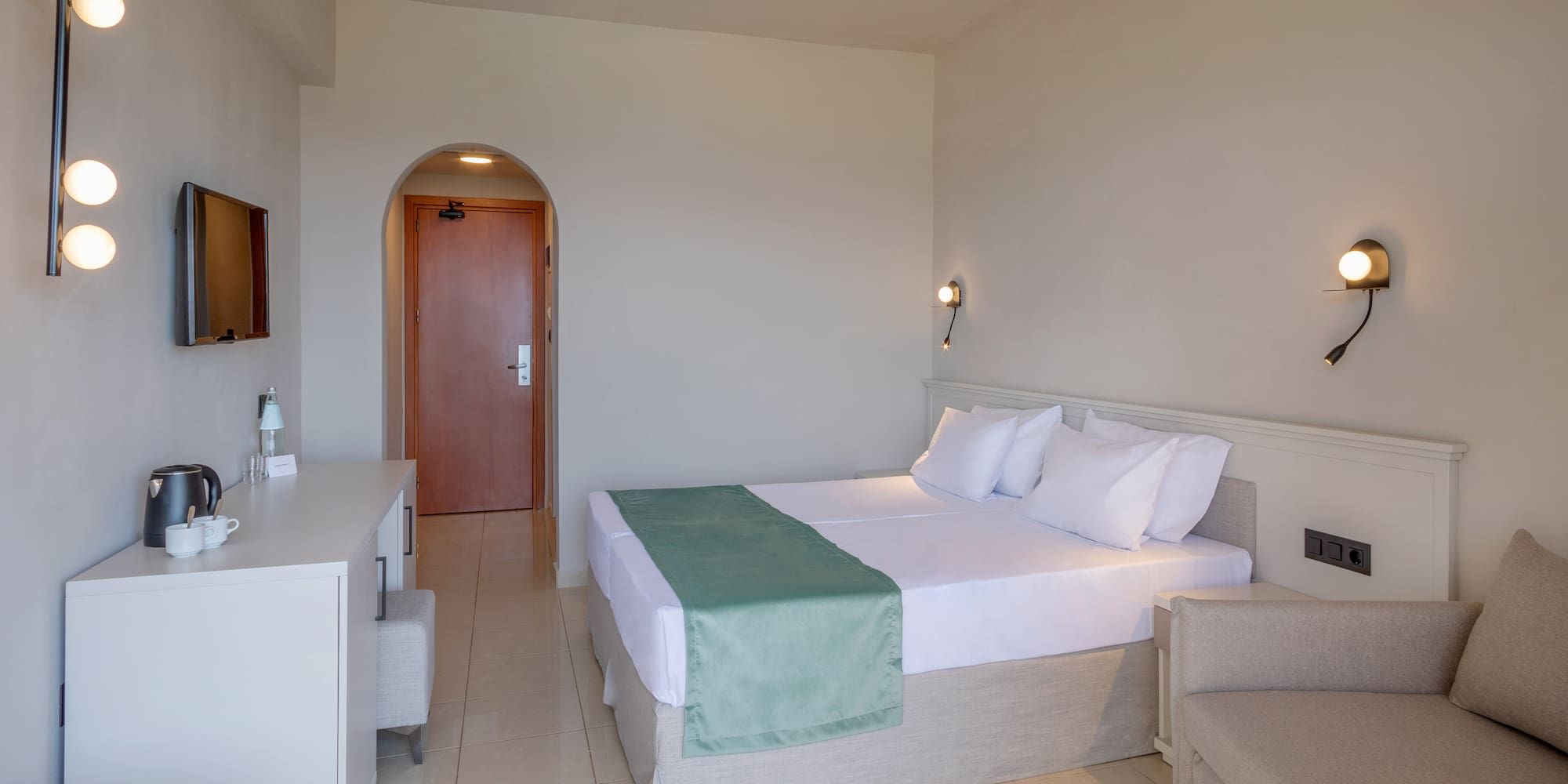 a room with a bed and a chair