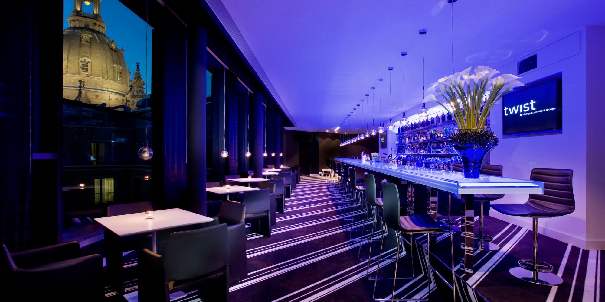 a room with tables and chairs