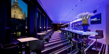 a room with tables and chairs