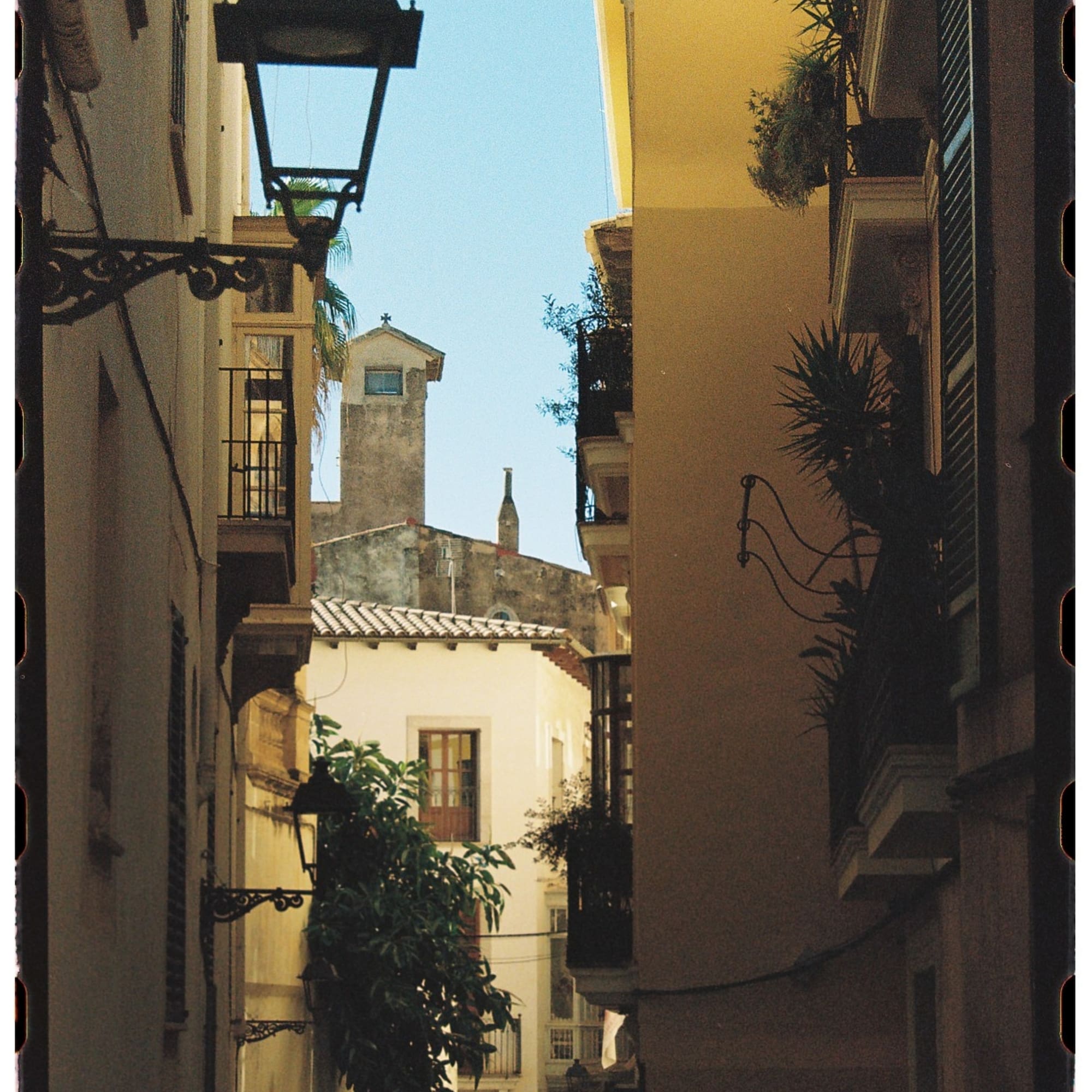a narrow alley between buildings