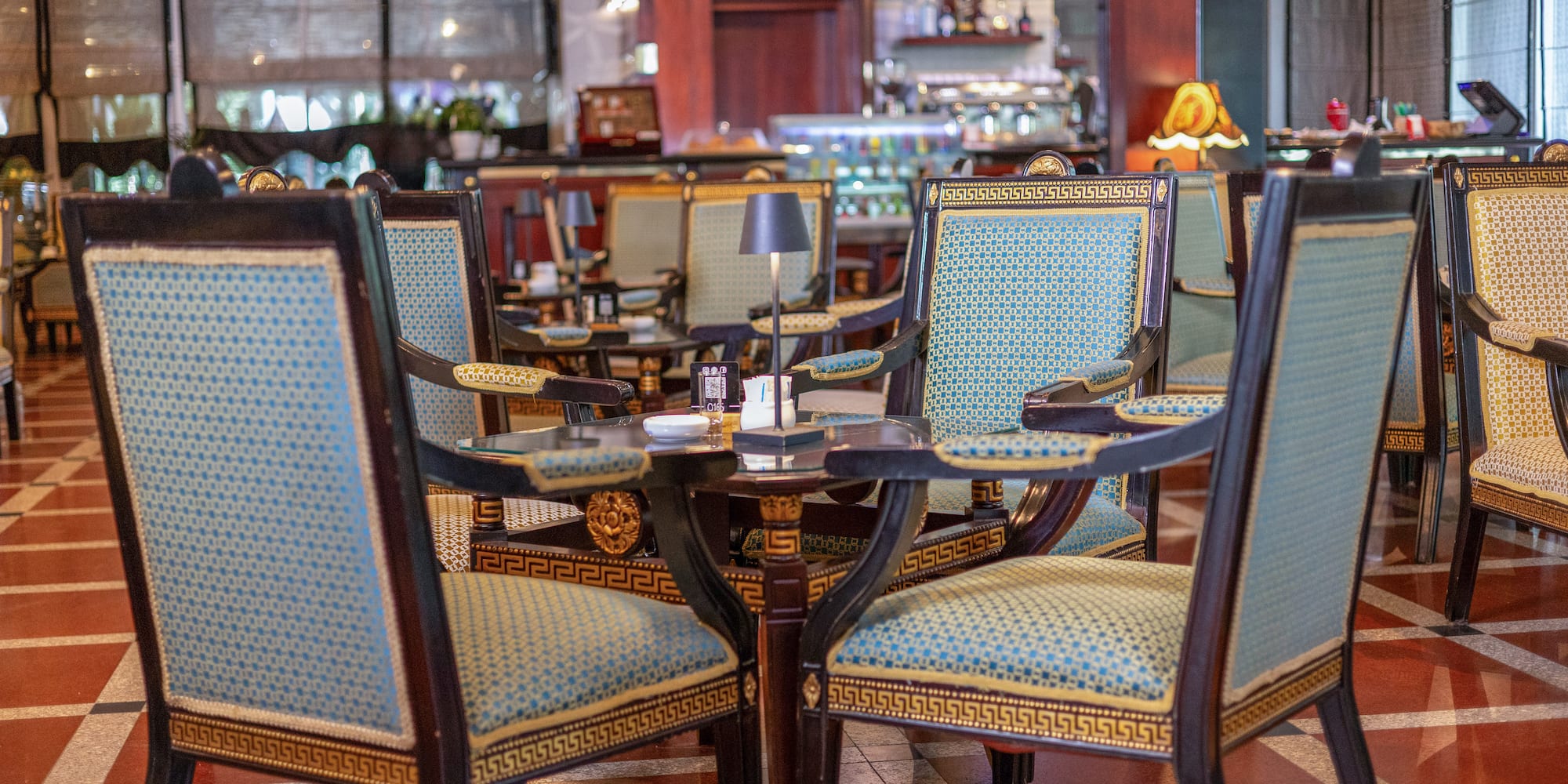 a table and chairs in a restaurant