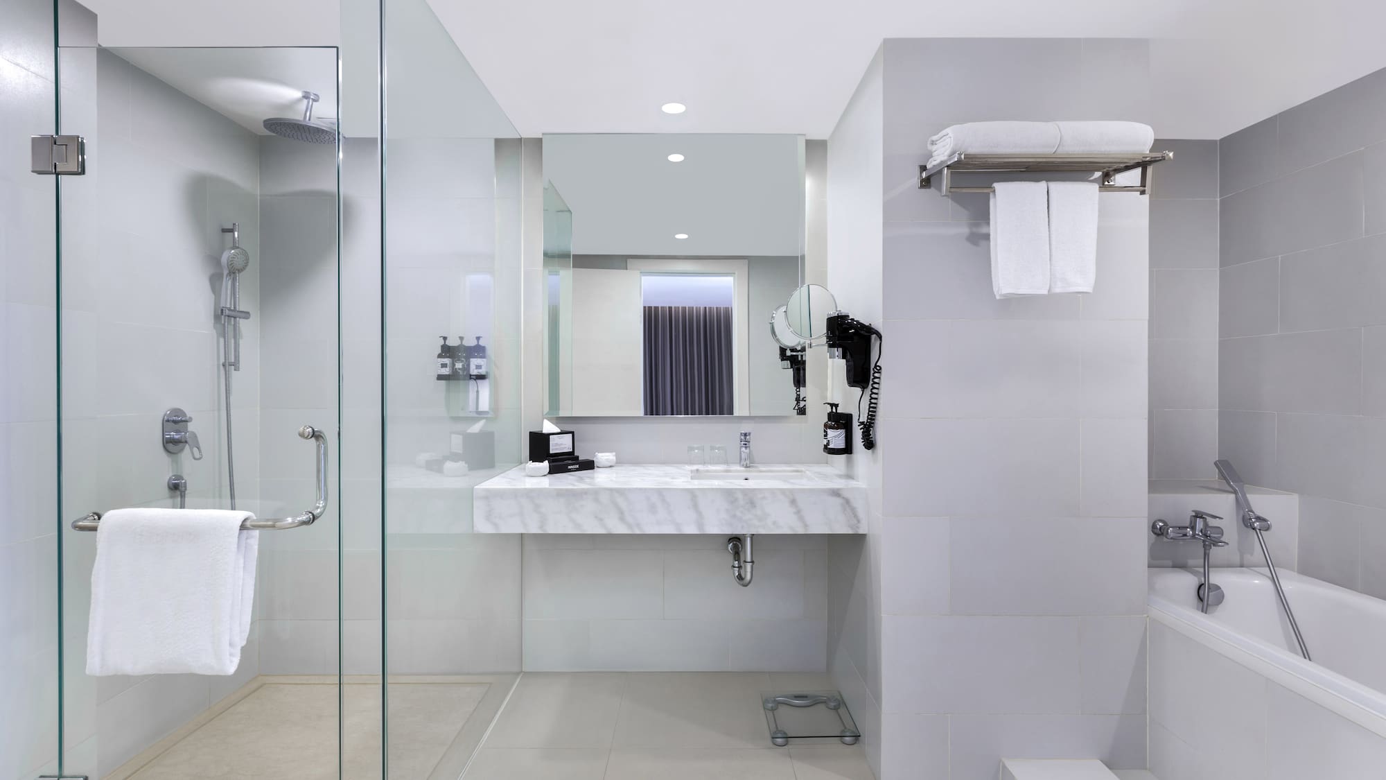 a bathroom with a shower and sink