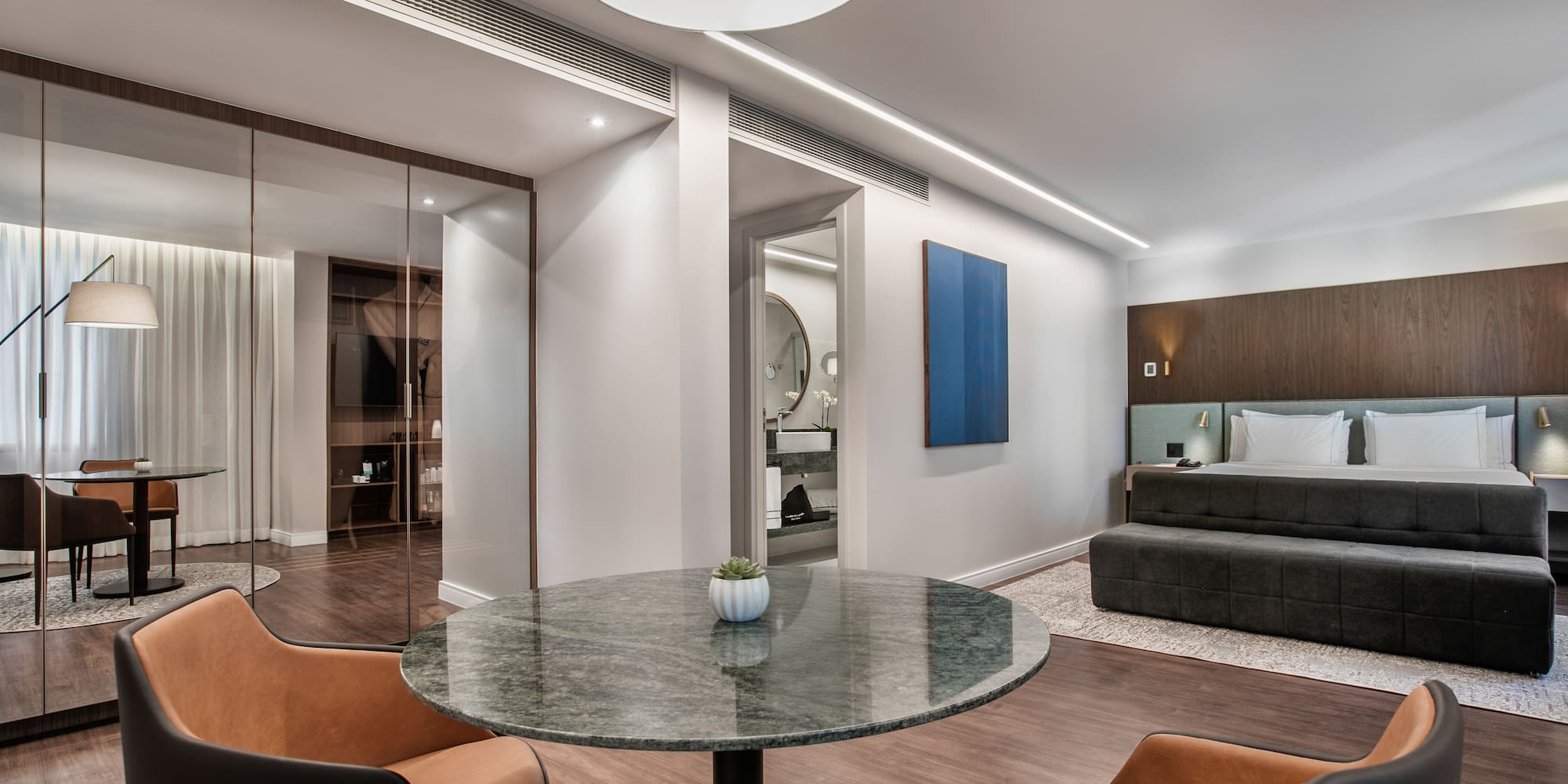 a room with a table and chairs