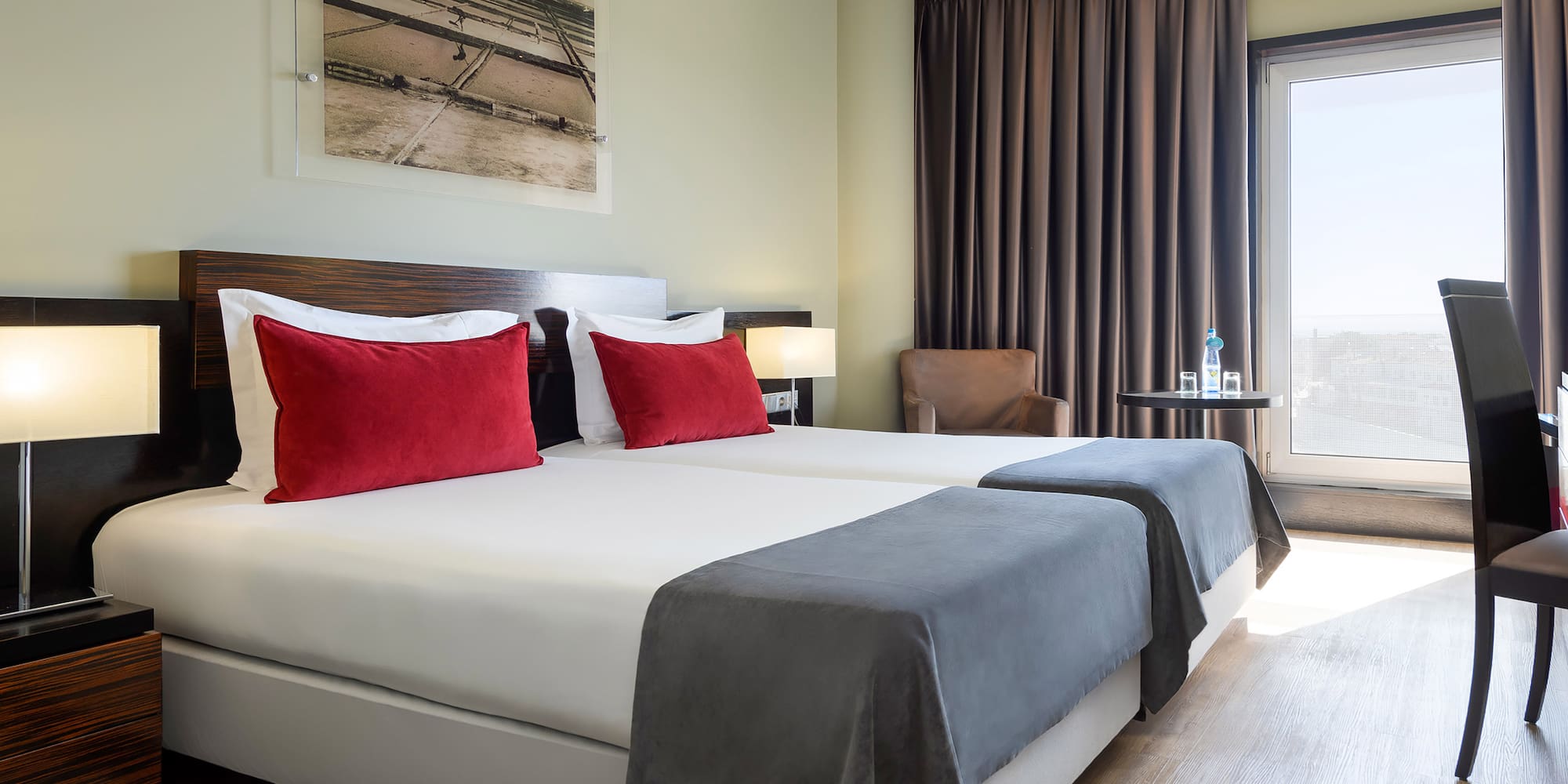 a hotel room with two beds