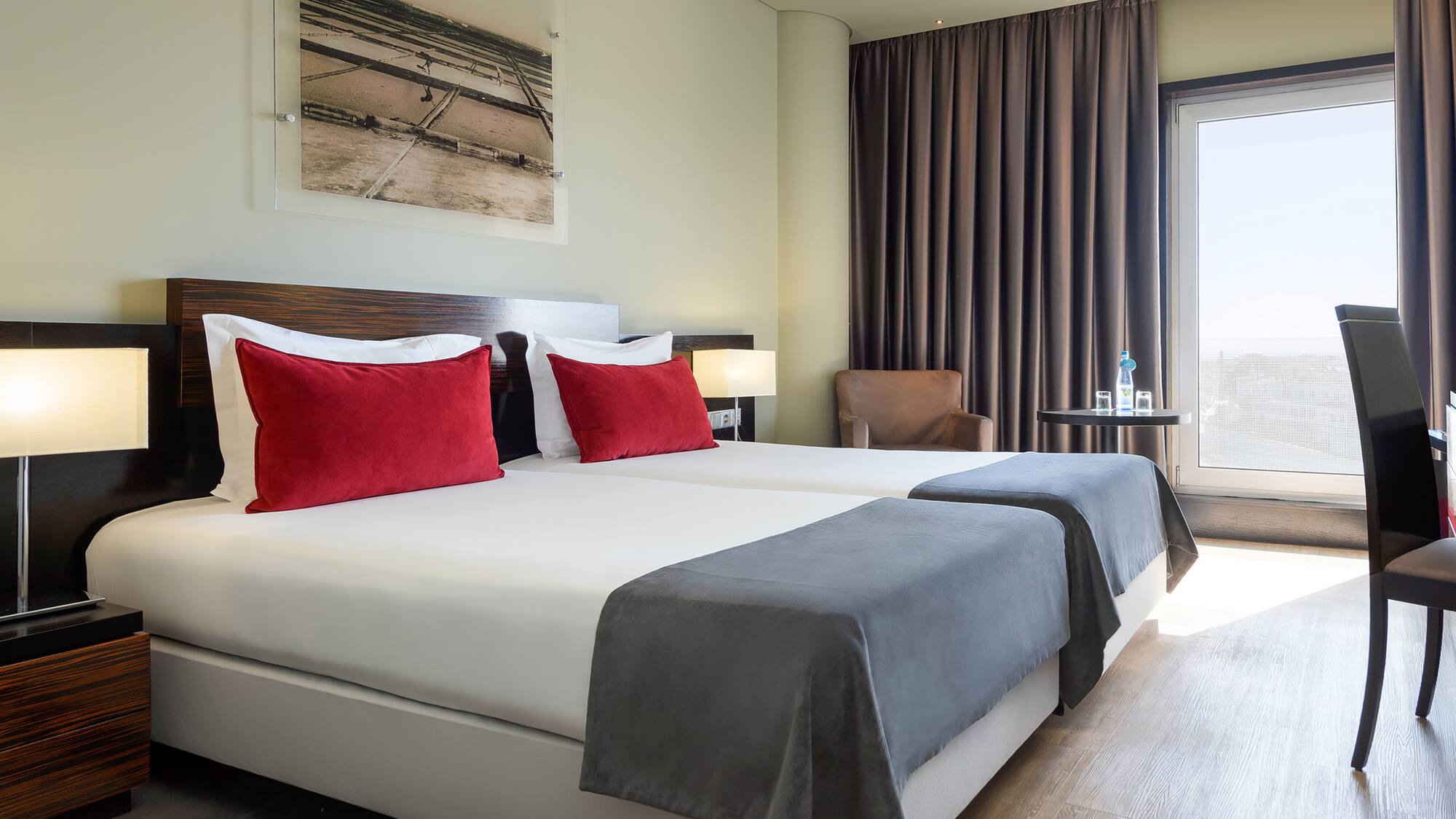 a hotel room with two beds