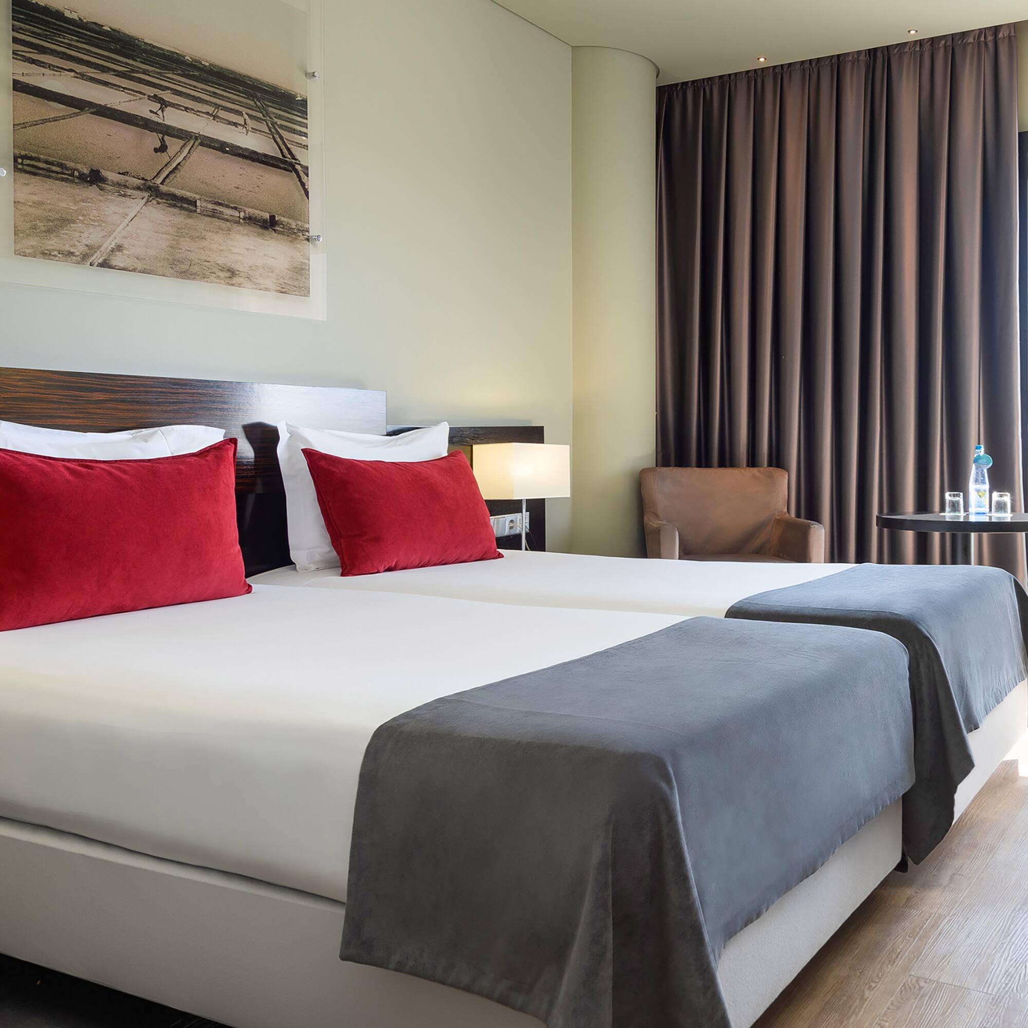 a hotel room with two beds