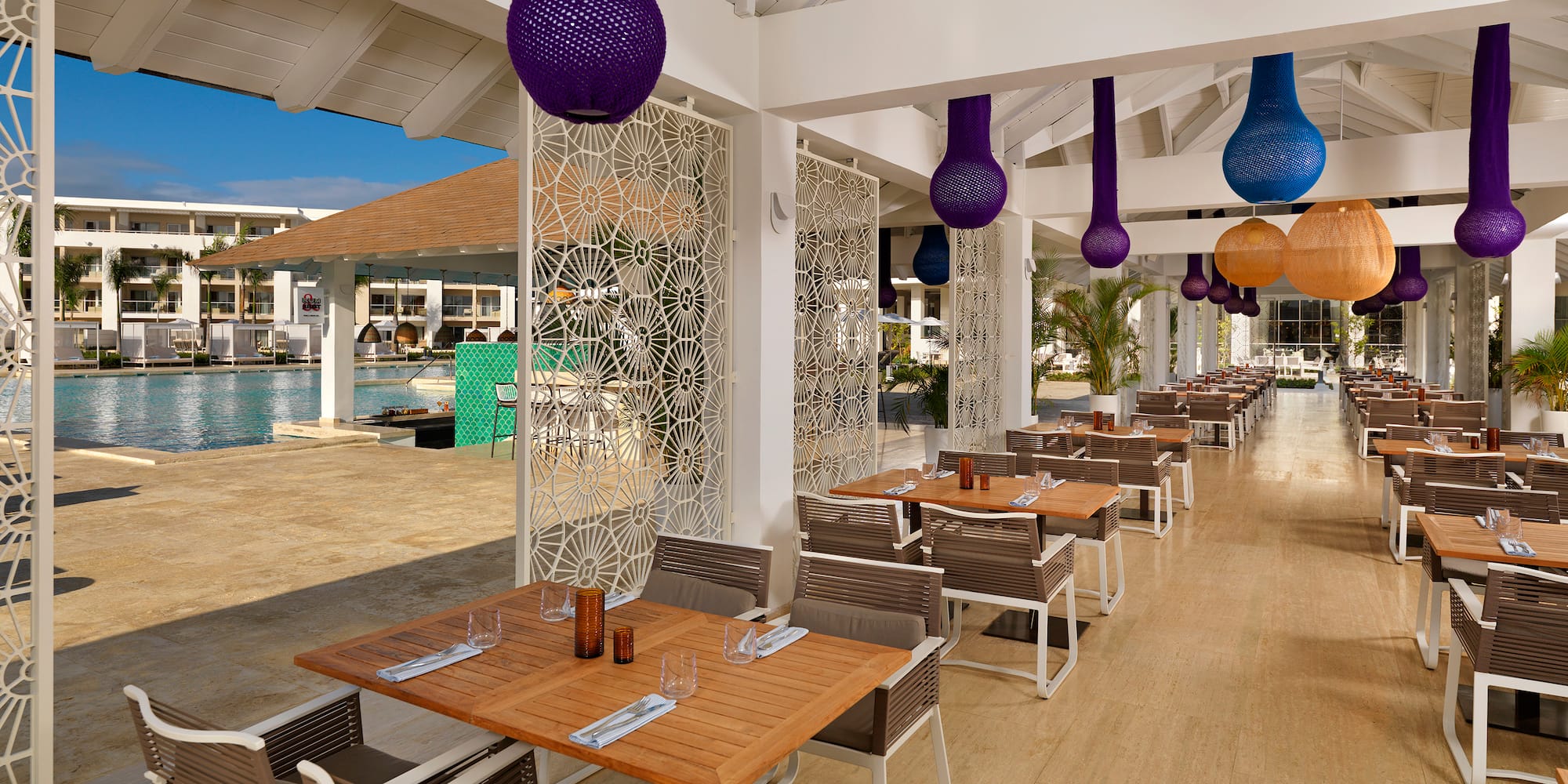 a restaurant with tables and chairs