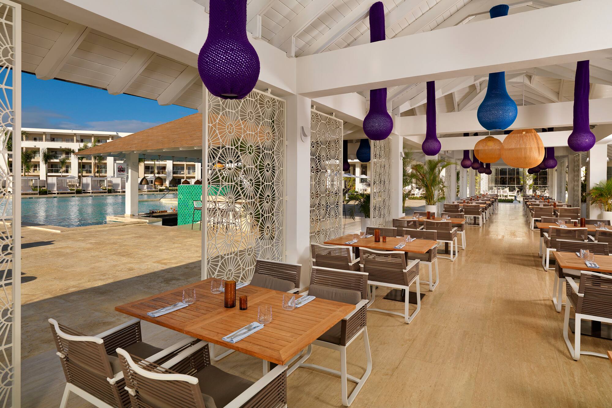 a restaurant with tables and chairs