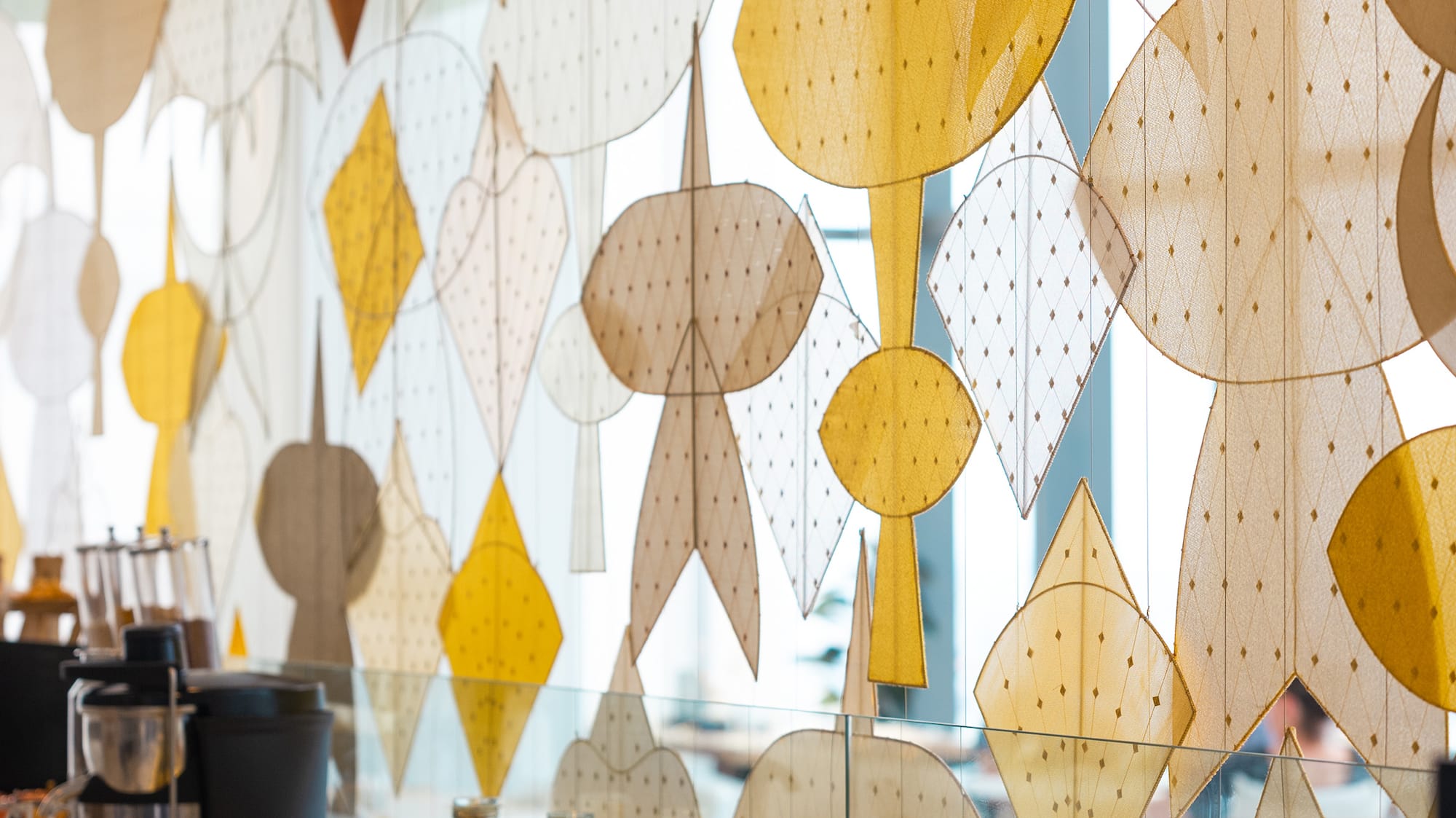 a wall with many different shapes and colors