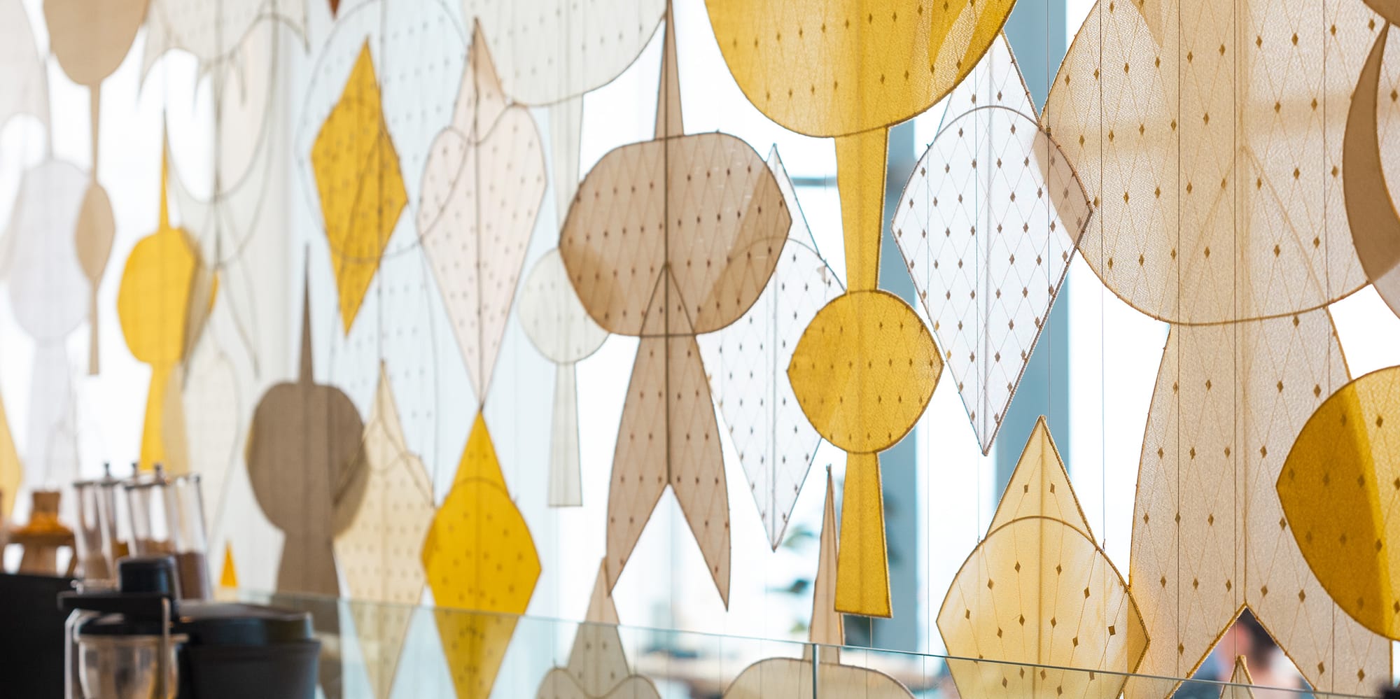 a wall with many different shapes and colors