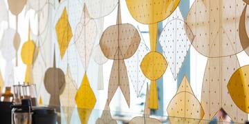 a wall with many different shapes and colors