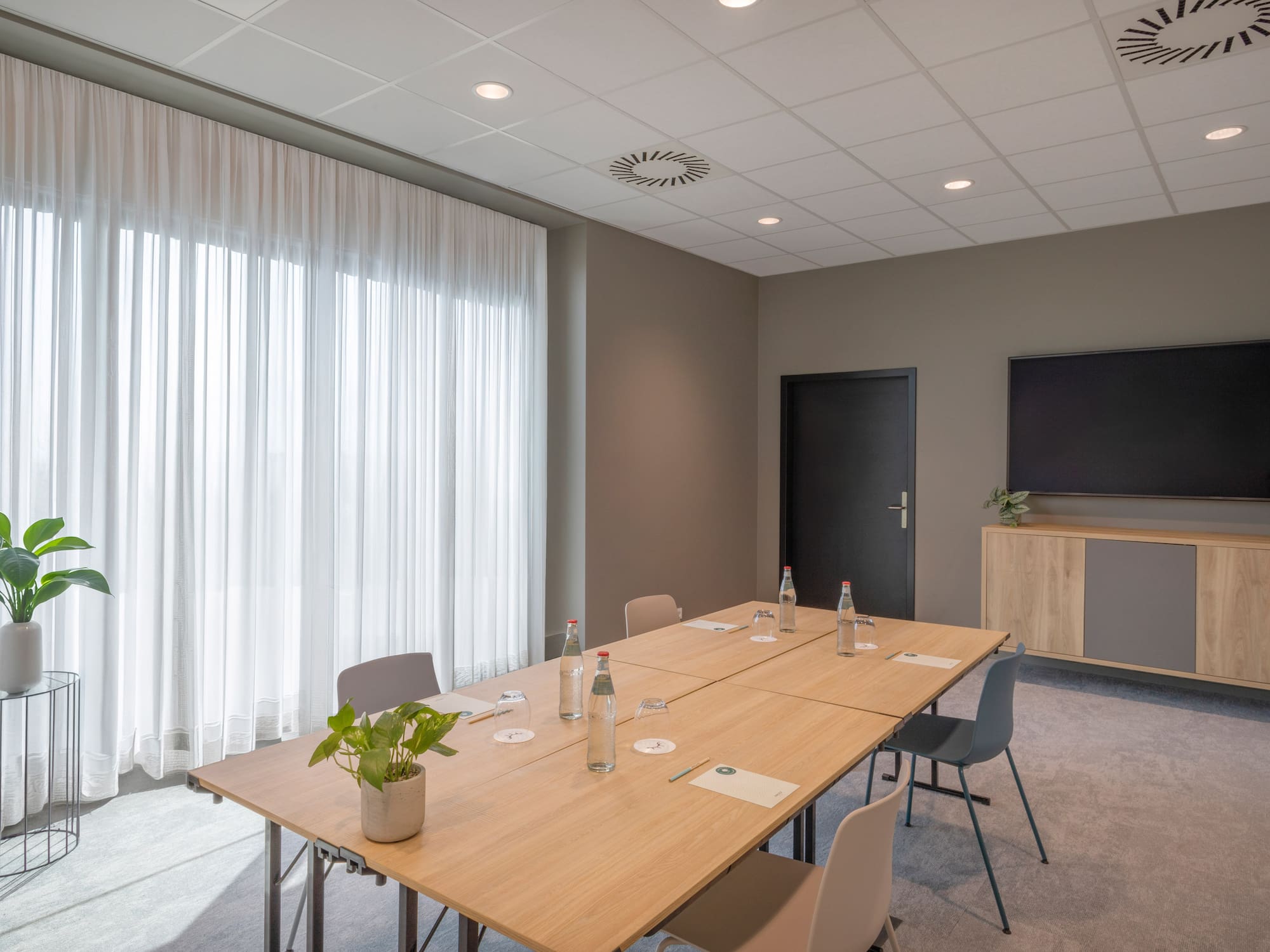 a room with a table and chairs