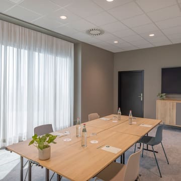 a room with a table and chairs