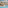 White resort hotel with large pool, palm trees, and outdoor dining area.