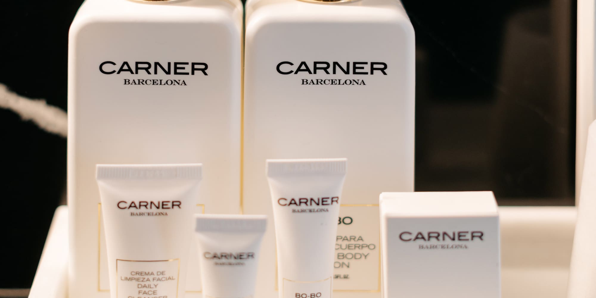 a group of white containers with black text on them