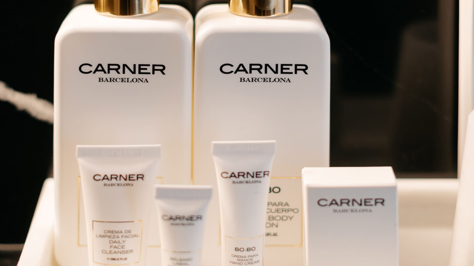 a group of white containers with black text on them