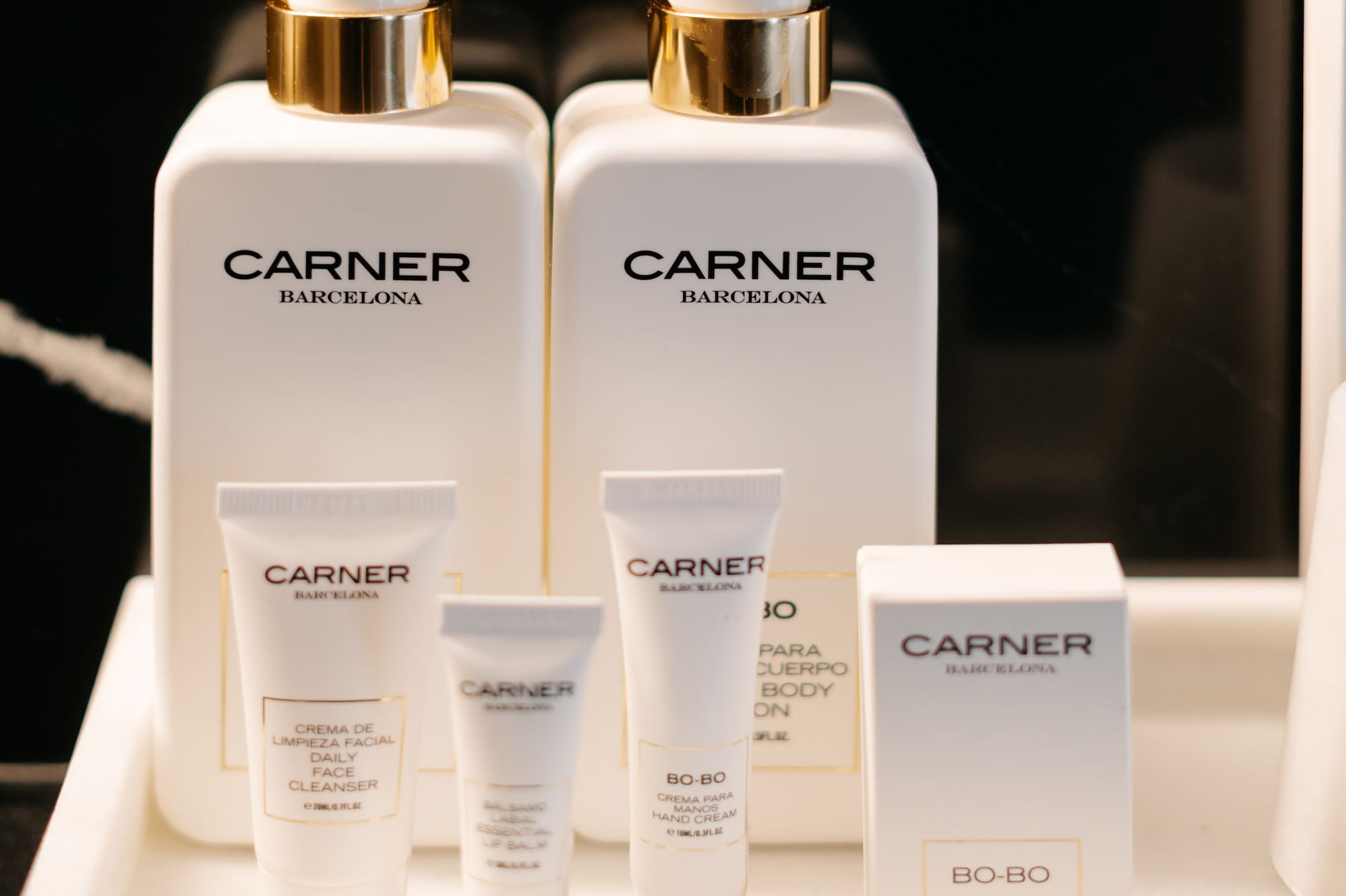 a group of white containers with black text on them