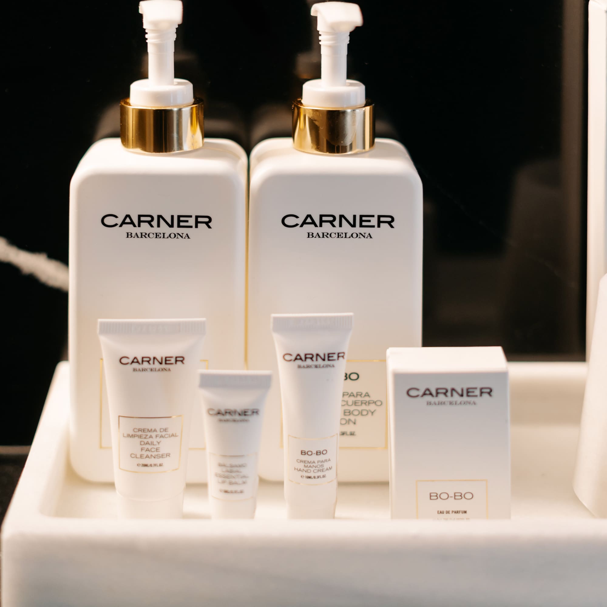 a group of white containers with black text on them